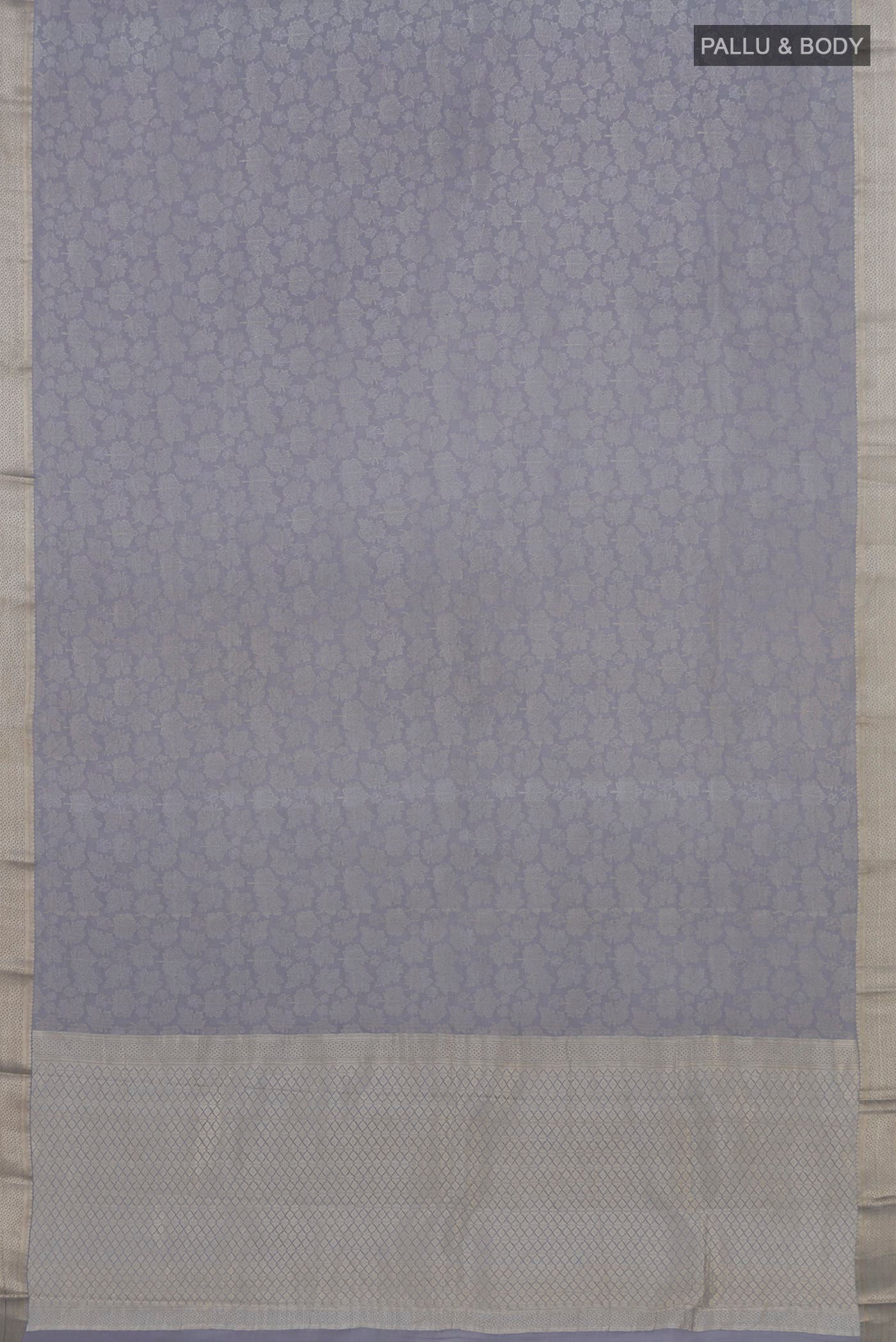 Flat view of Grey Mysore Crepe Saree with Zari Brocade on the body and Zari Border. 