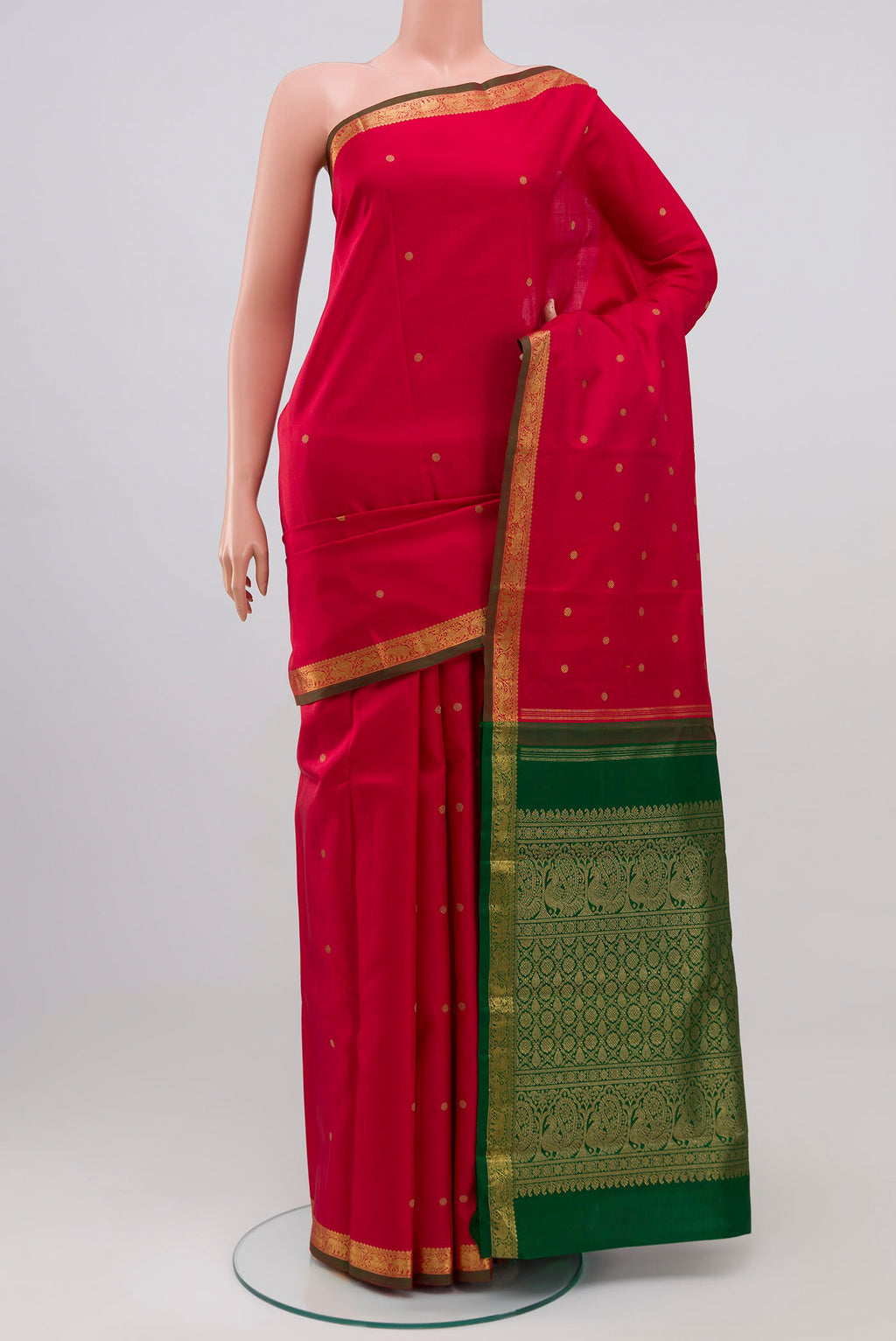 Pure Silk Pure Zari Maroon Kanchipuram Saree with Zari Butta on the body and Zari Border.  displayed on a mannequin