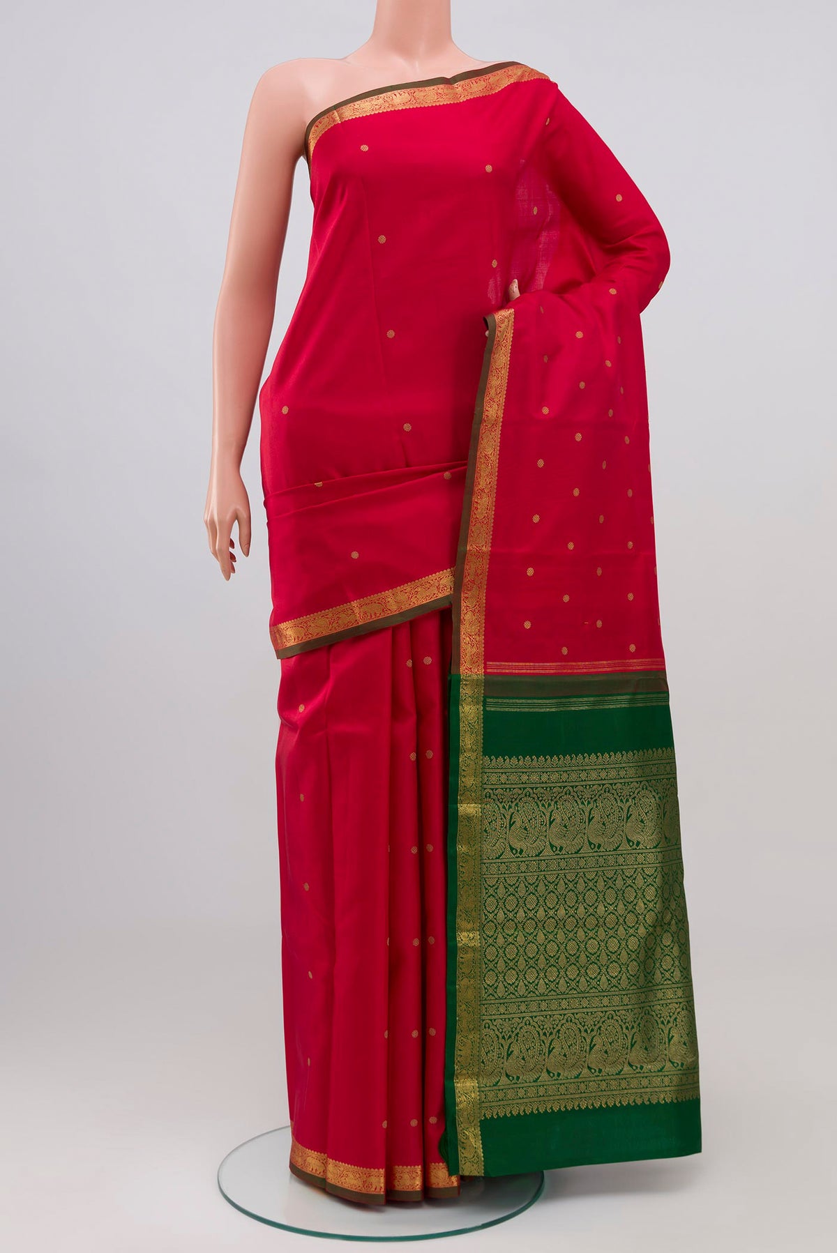 Pure Silk Pure Zari Maroon Kanchipuram Saree with Zari Butta on the body and Zari Border.  displayed on a mannequin
