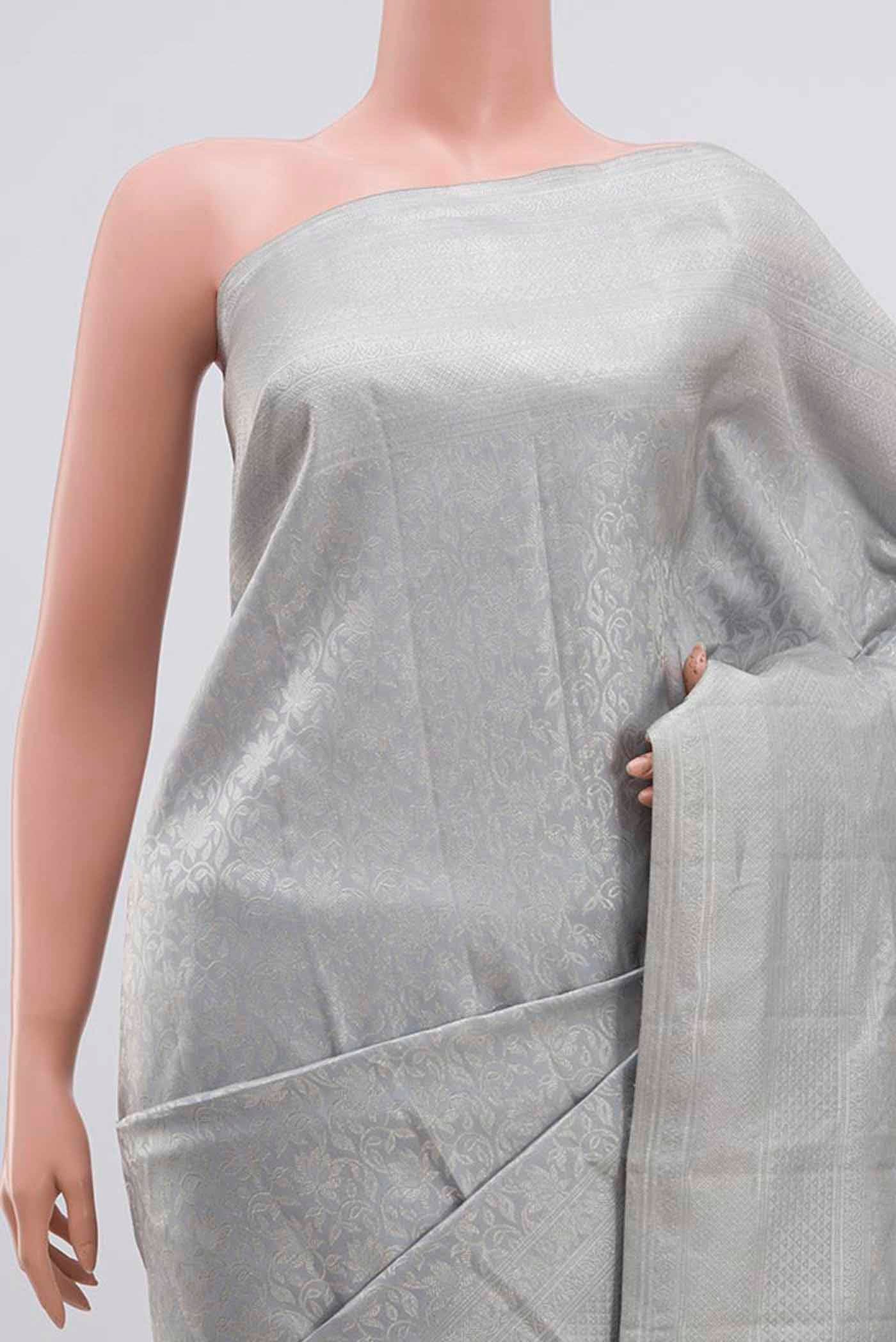 Border image of Grey Kanchipuram Silk Saree with Zari Brocade on the body and Zari Border. 