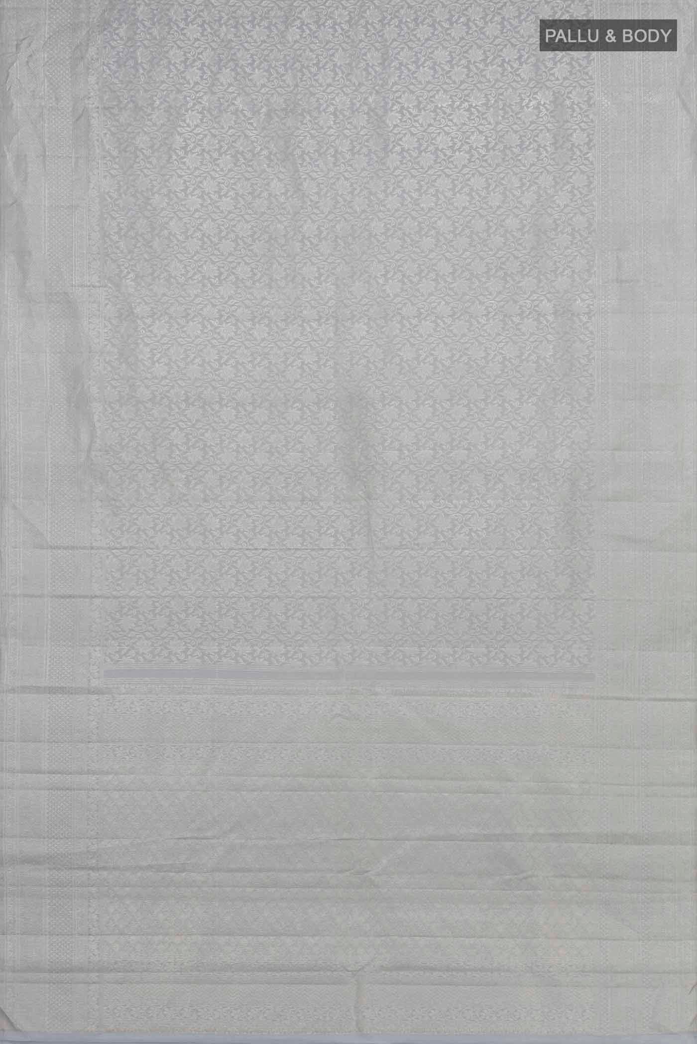 Flat view of Grey Kanchipuram Silk Saree with Zari Brocade on the body and Zari Border. 