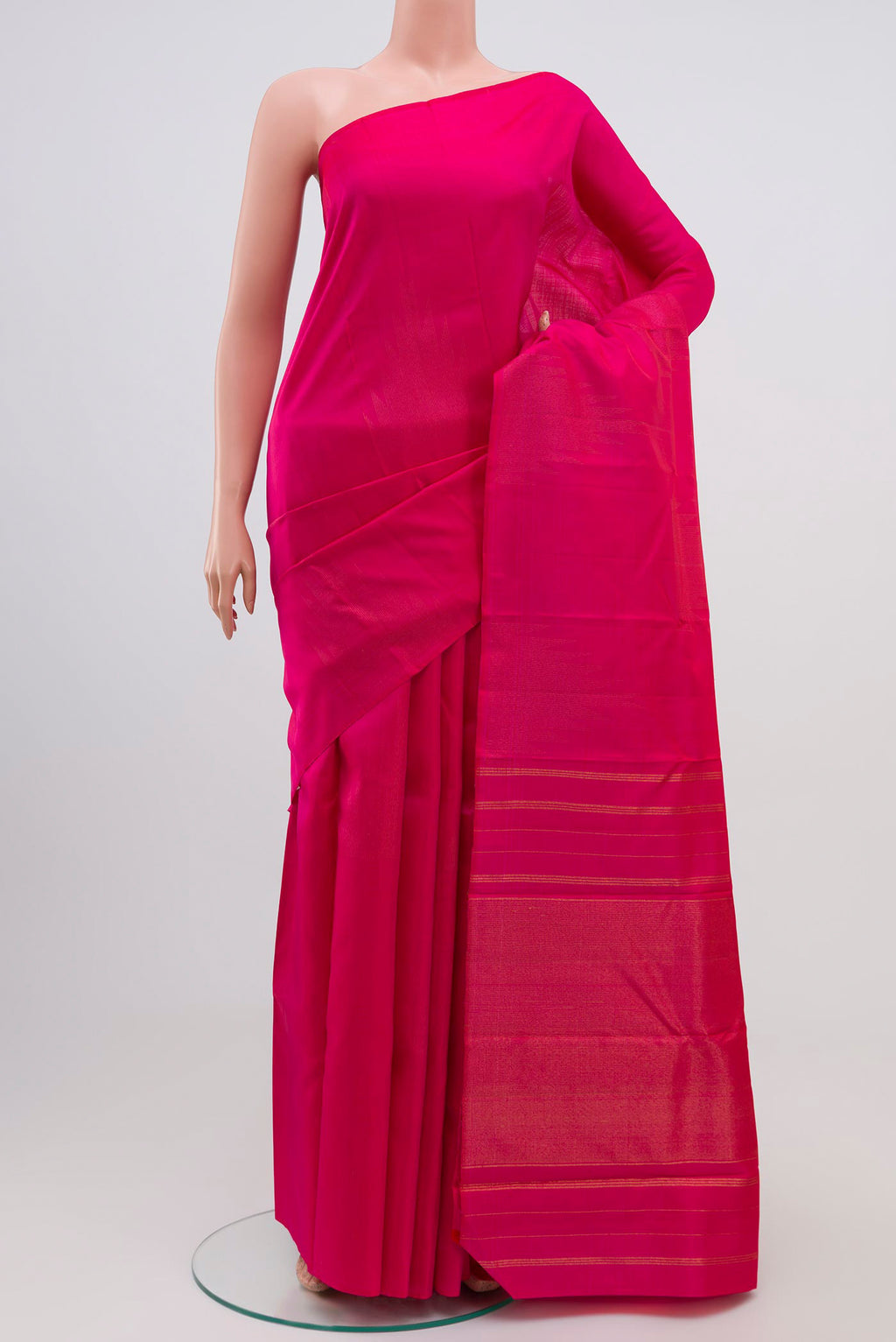 Pink Kanjivaram Silk Saree with Zari Butta on the body and Temple Border.  displayed on a mannequin