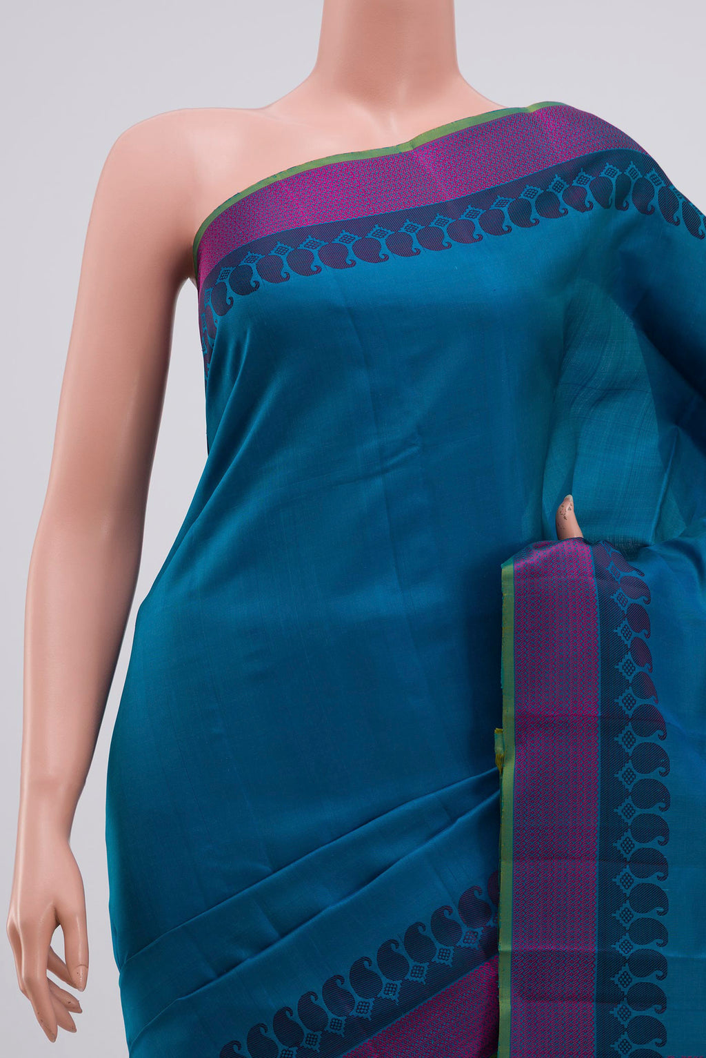 Border image of Blue Kanchipuram Silk Saree with Plain Body and Thread Border. 