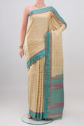 Cream Kanchipuram Silk Saree with Checked design on the body and Thread Border.  displayed on a mannequin