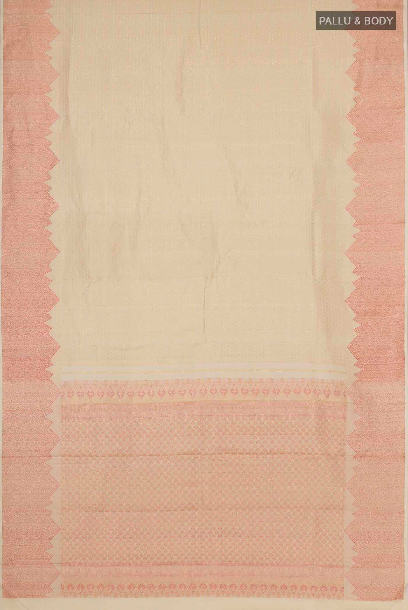 Flat view of Cream Kanchipuram Silk Saree with Zari Brocade on the body and Temple Border. 