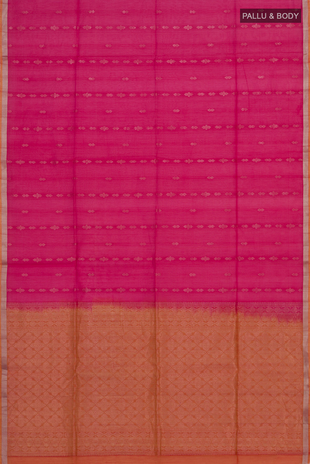 Flat view of Pink Silk Cotton Saree with Zari Butta on the body and Thin Zari Line. 