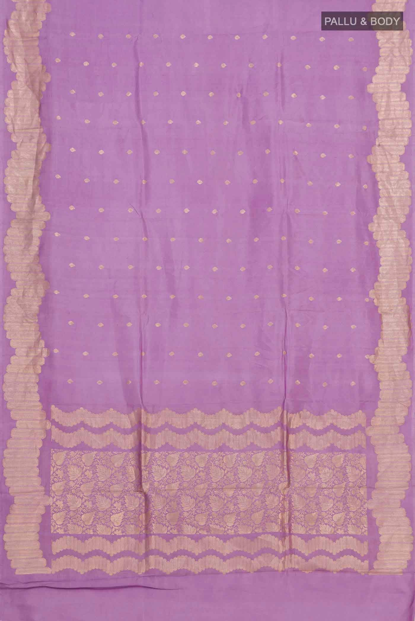 Flat view of Lavender Banarasi Katan Silk Saree with Zari Butta on the body and Zari Border. 