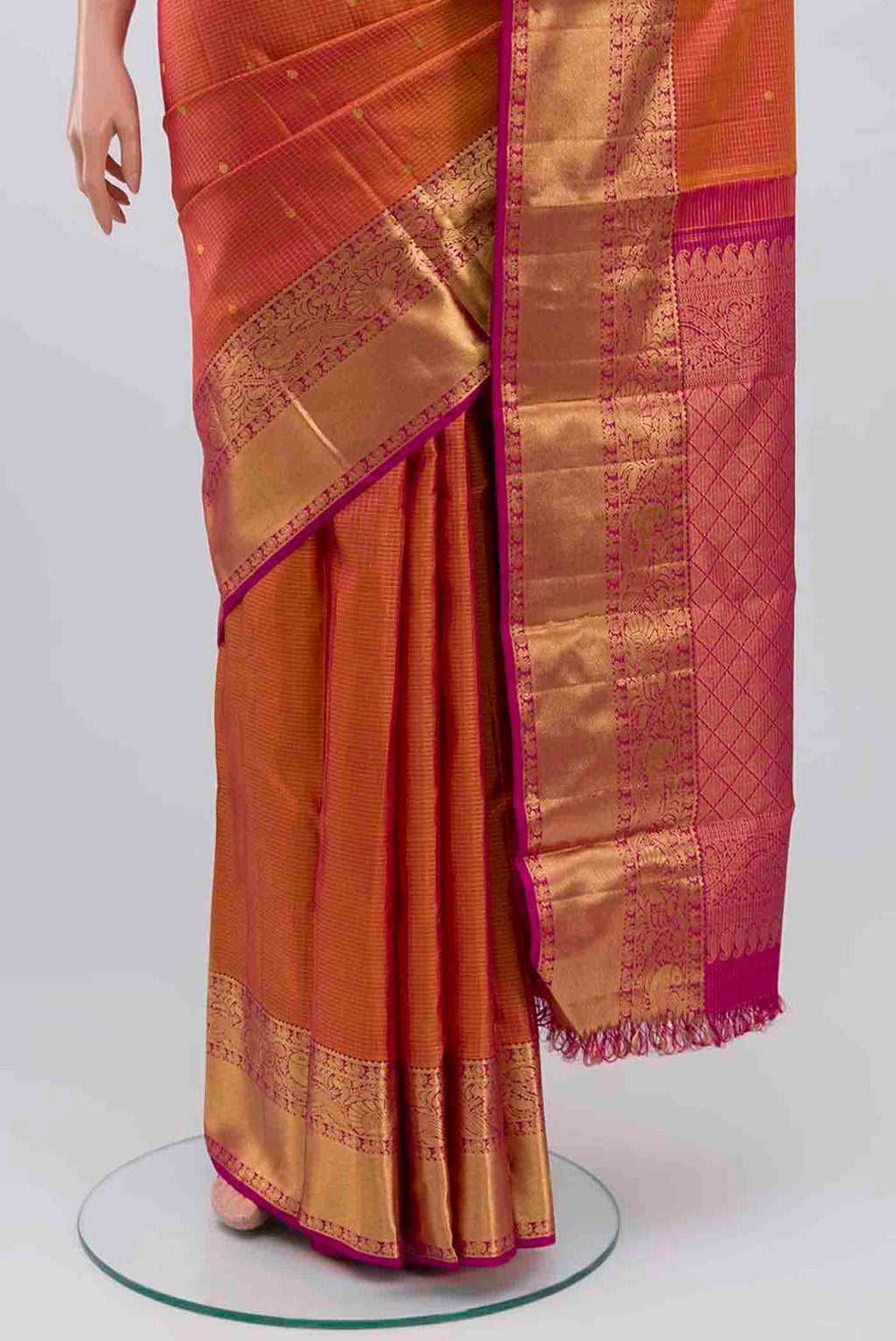 Pleats and pallu of Pink with Mustard Color Kanchipuram Silk Saree with Checked design on the body and Zari Border