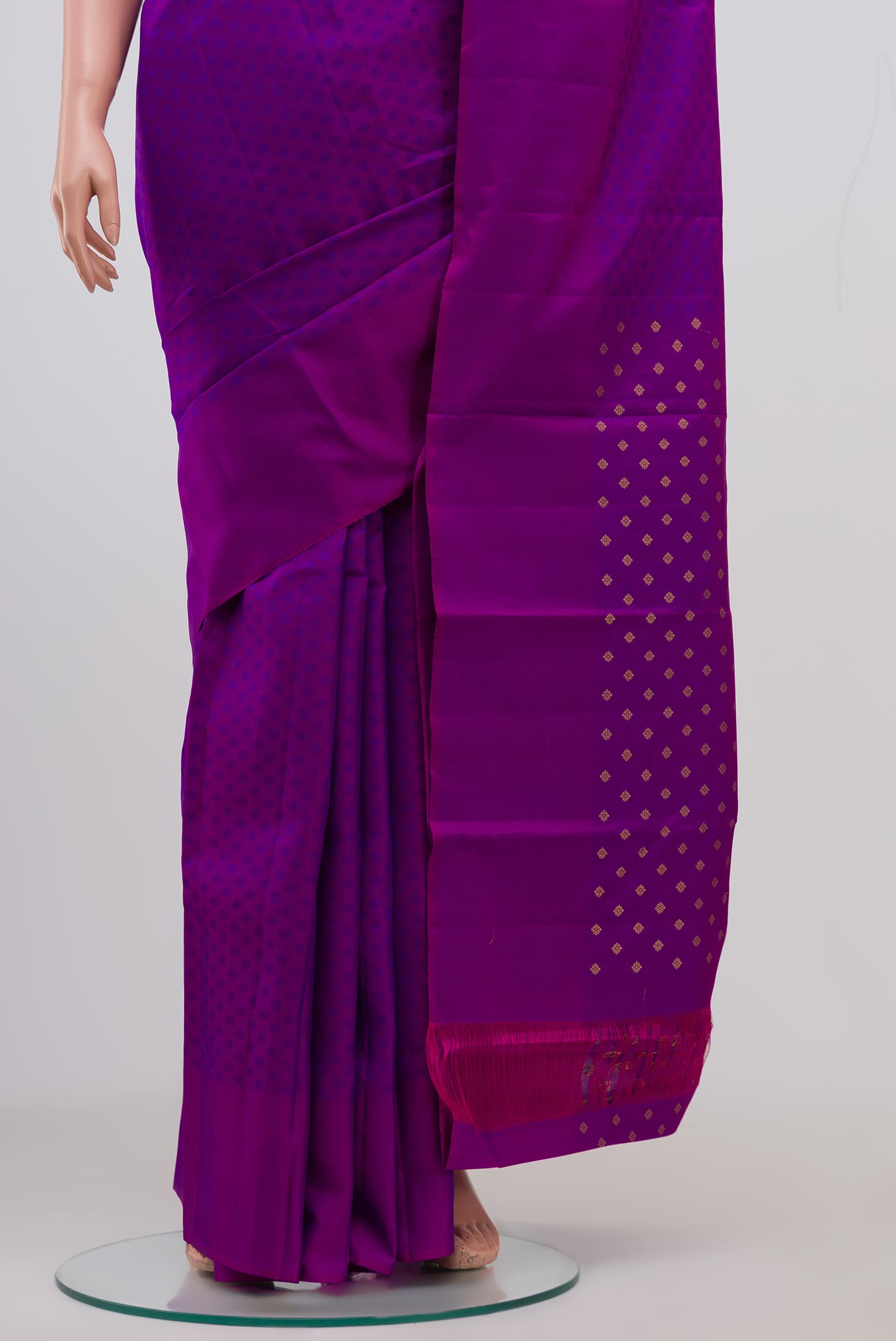 Pleats and pallu of Purple Kanjivaram Saree with Jacquard design on the body and Plain Border. 