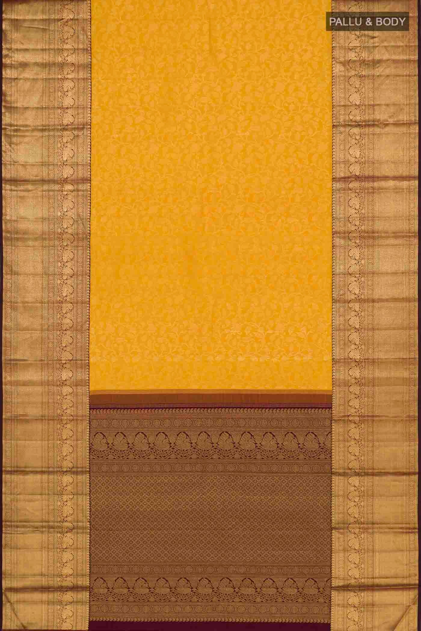 Flat view of Mustard Kanchipuram Silk Saree with Zari Brocade on the body and Zari Border. 