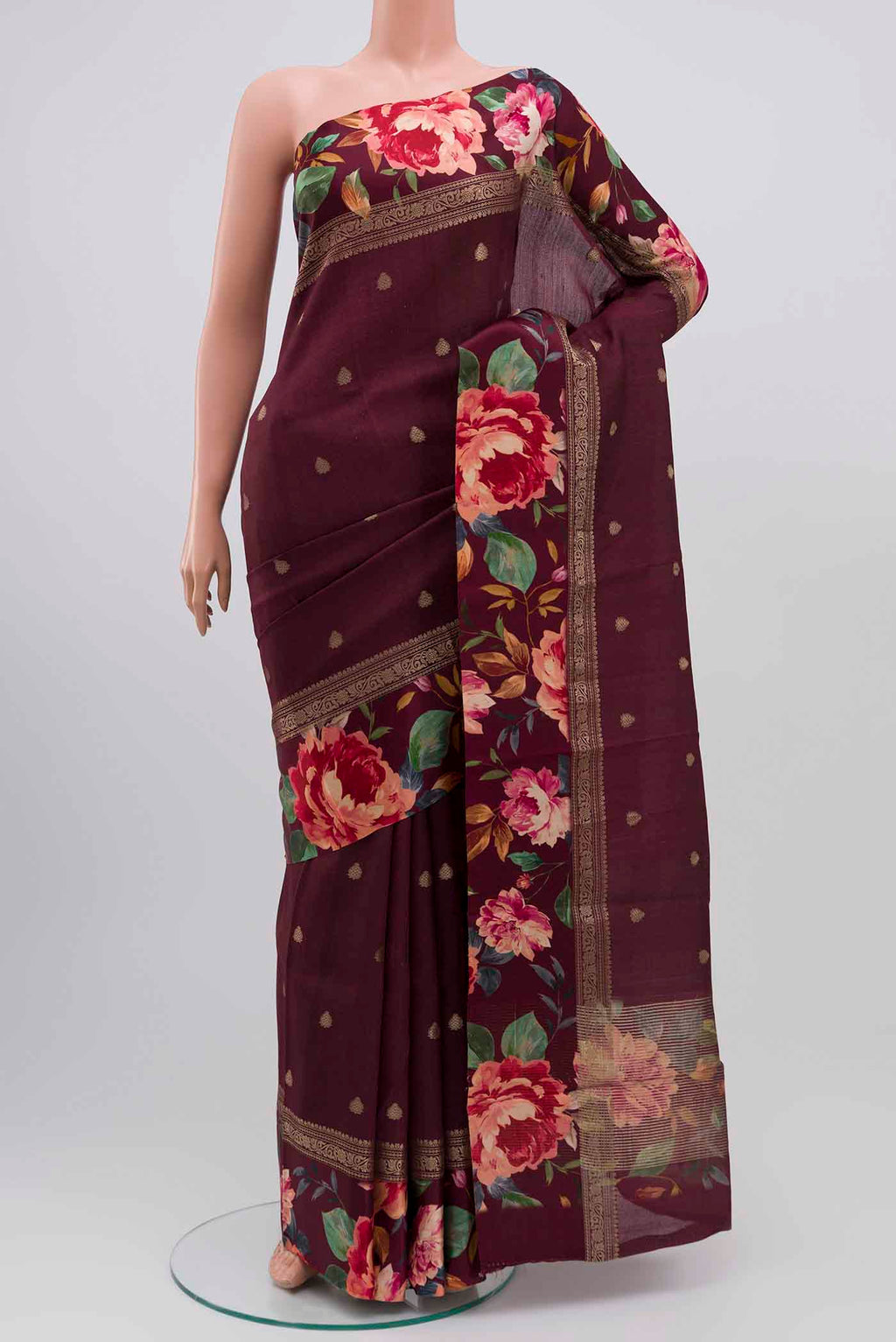 Burgundy Tussar Silk Saree with Zari Butta on the body and Fancy Border displayed on a mannequin