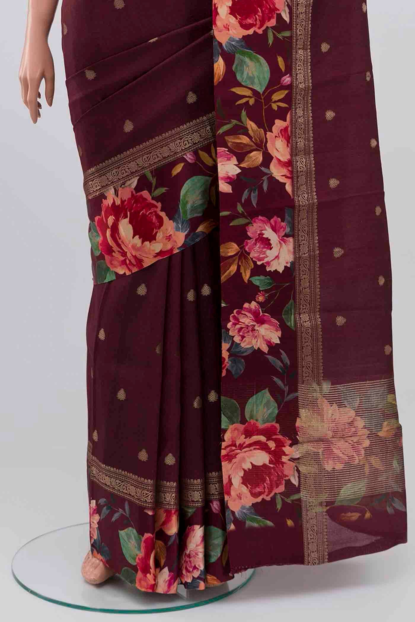 Pleats and pallu of Burgundy Tussar Silk Saree with Zari Butta on the body and Fancy Border