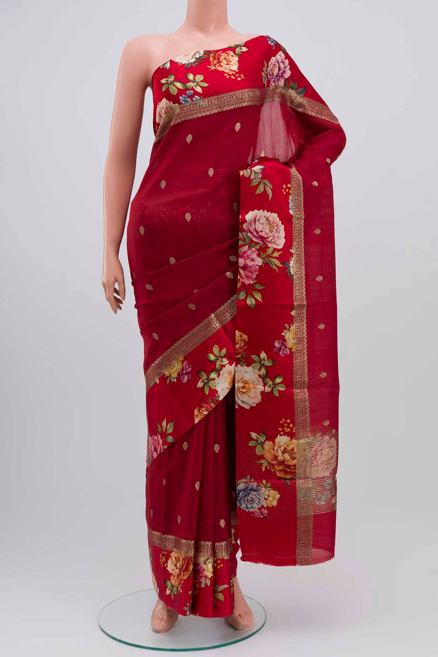 Maroon Tussar Silk Saree with Zari Butta on the body and Fancy Border displayed on a mannequin