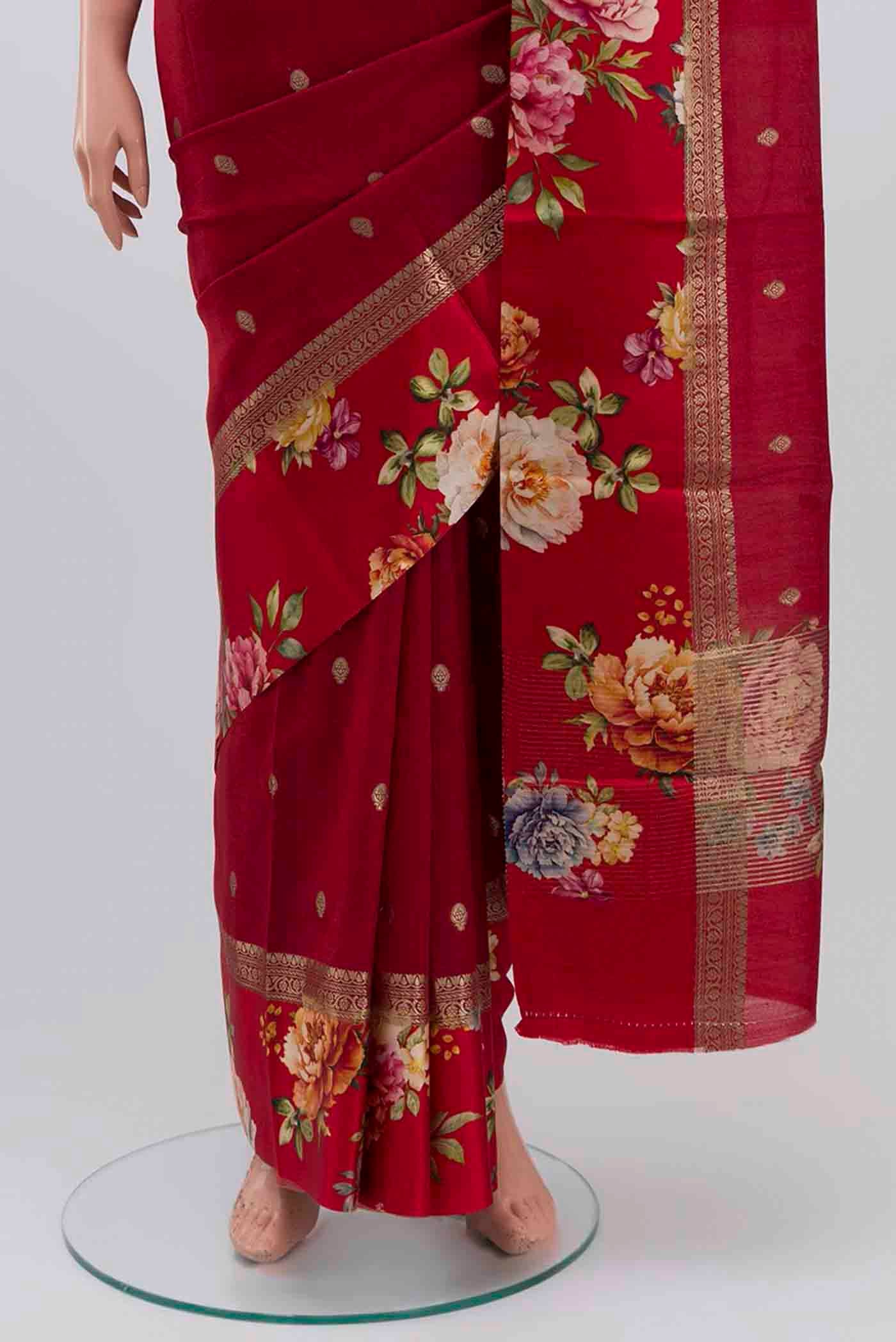 Pleats and pallu of Maroon Tussar Silk Saree with Zari Butta on the body and Fancy Border