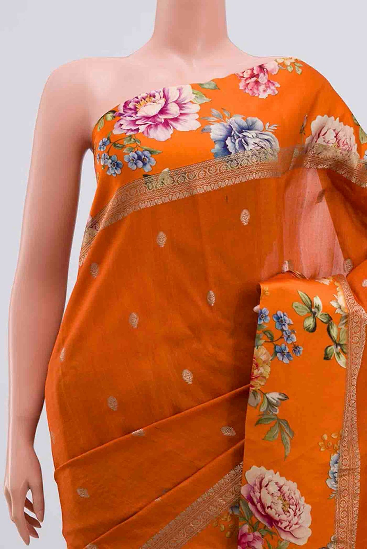 Border image of Orange Tussar Silk Saree with Zari Butta on the body and Fancy Border