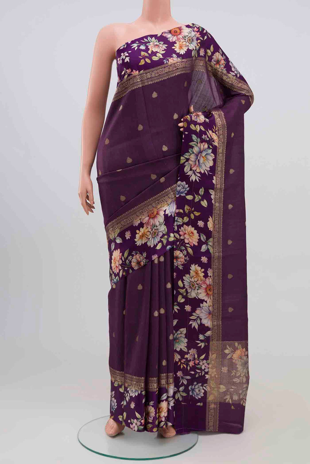 Purple Tussar Silk Saree with Zari Butta on the body and Printed Border.  displayed on a mannequin