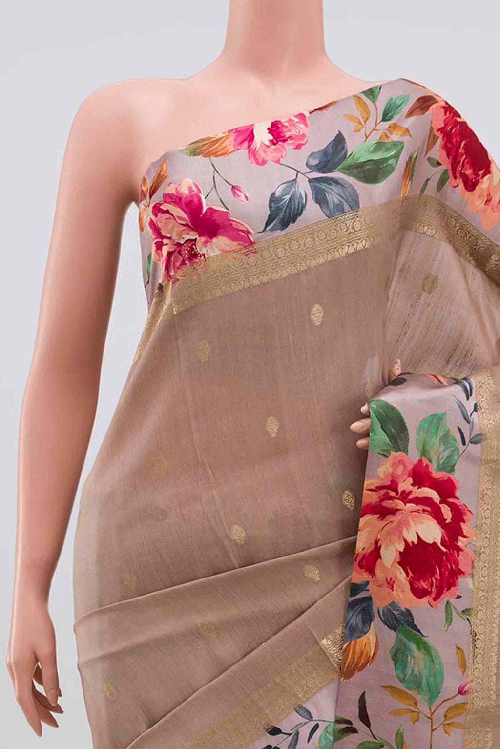 Border image of Brown Tussar Silk Saree with Zari Butta on the body and Printed Border. 