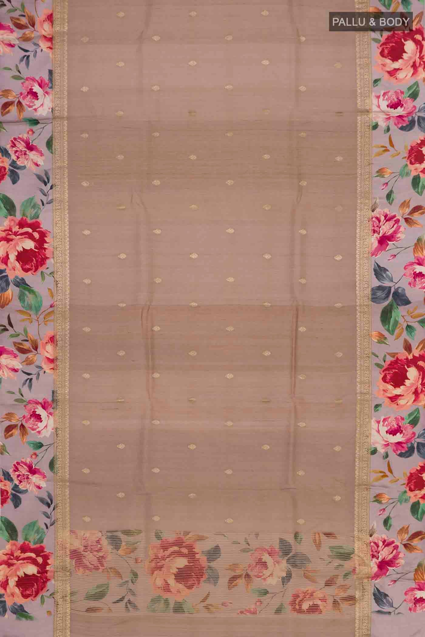 Flat view of Brown Tussar Silk Saree with Zari Butta on the body and Printed Border. 