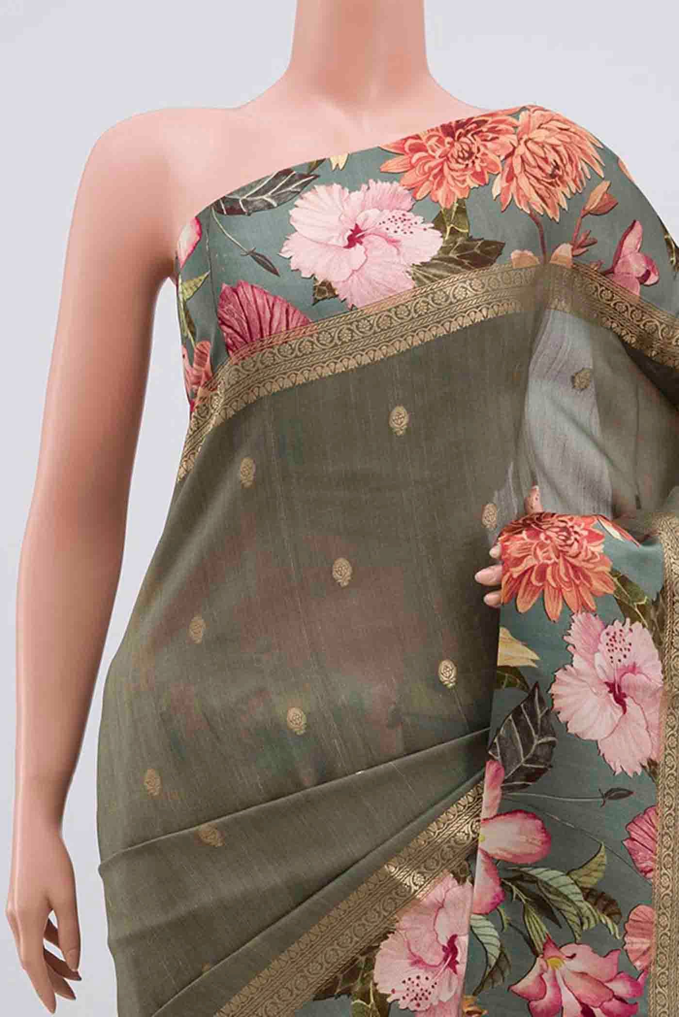 Border image of Grey Tussar Silk Saree with Zari Butta on the body and Printed Border. 