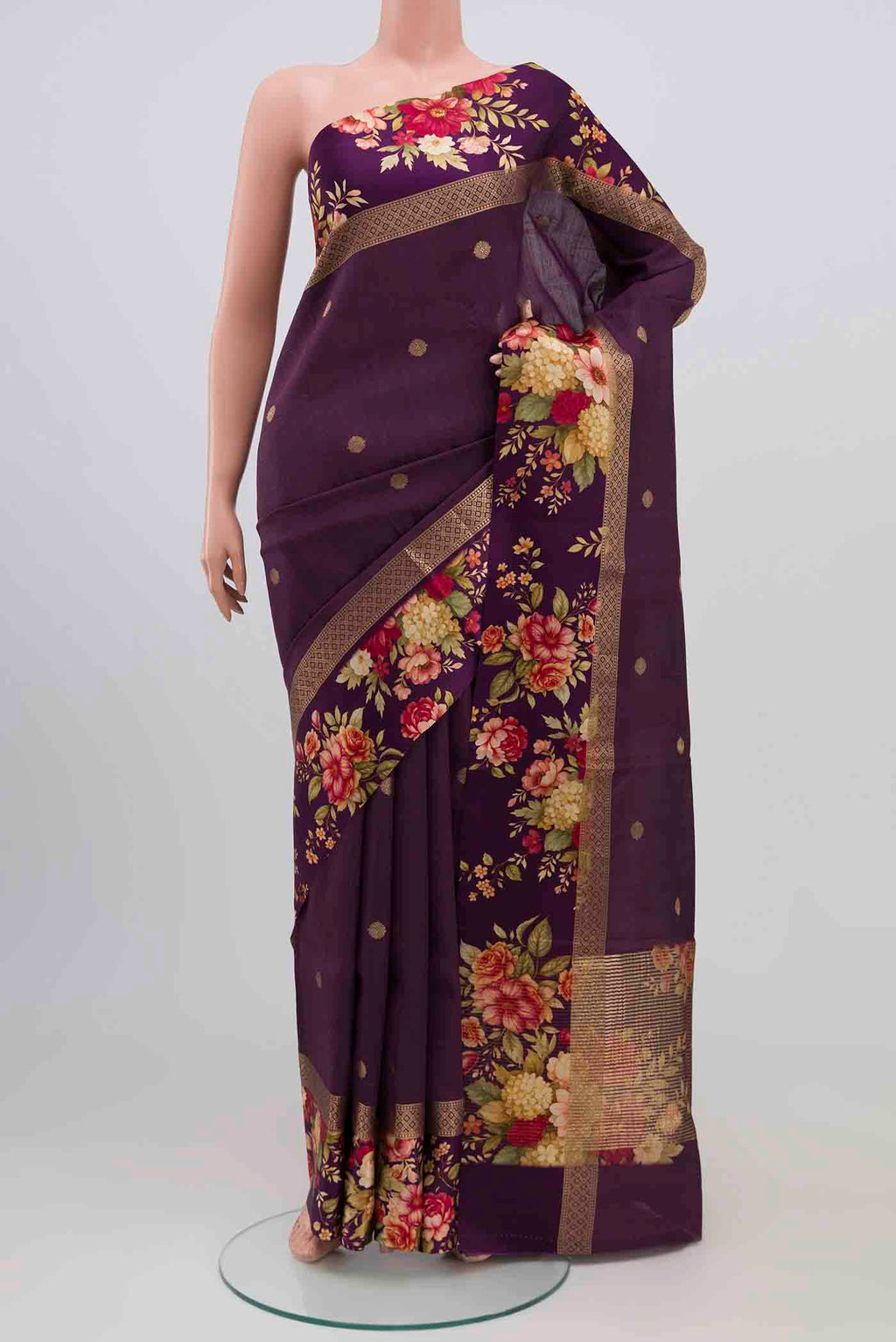 Purple Tussar Silk Saree with Zari Butta on the body and Printed Border.  displayed on a mannequin