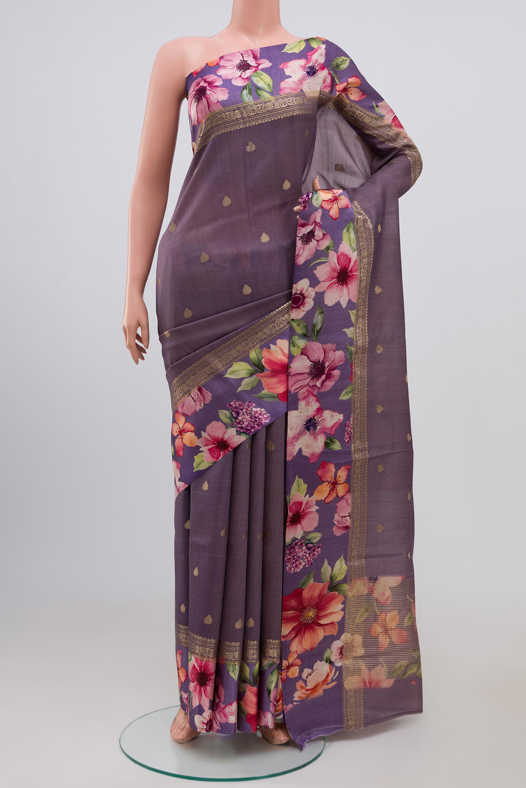 Lavender Tussar Silk Saree with Zari Butta on the body and Fancy Border.  displayed on a mannequin