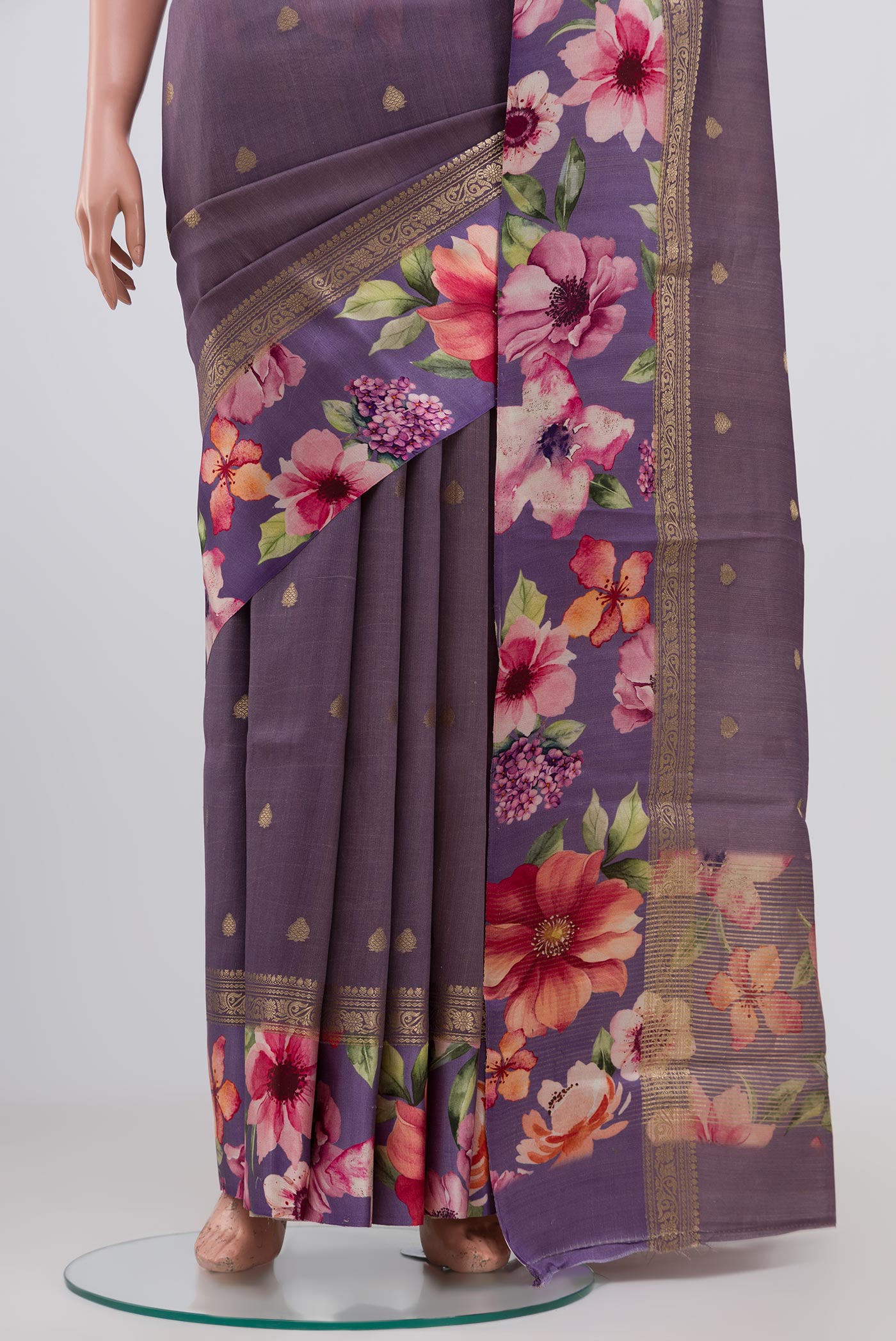 Pleats and pallu of Lavender Tussar Silk Saree with Zari Butta on the body and Fancy Border. 