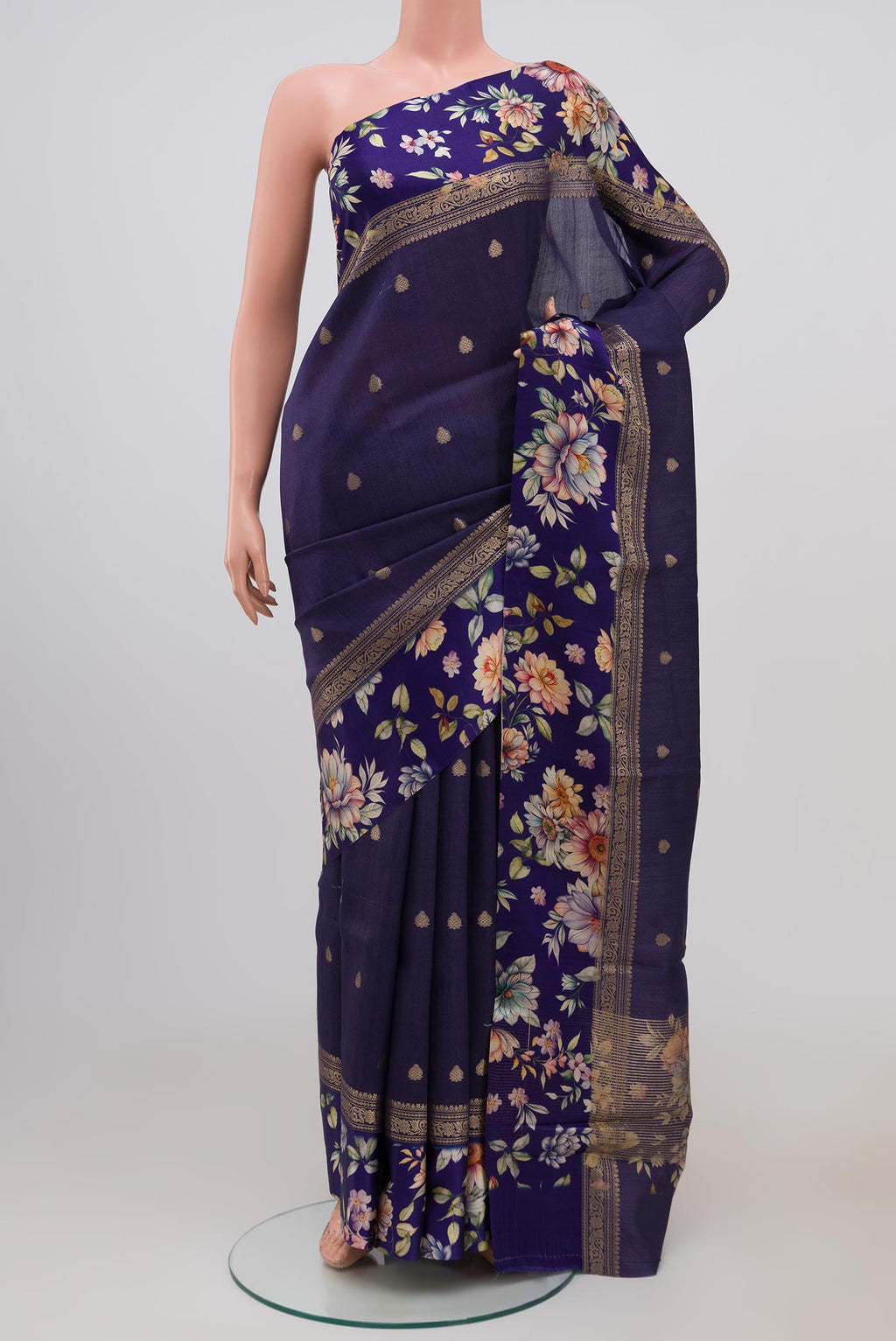 Blue Tussar Silk Saree with Zari Butta on the body and Fancy Border.  displayed on a mannequin