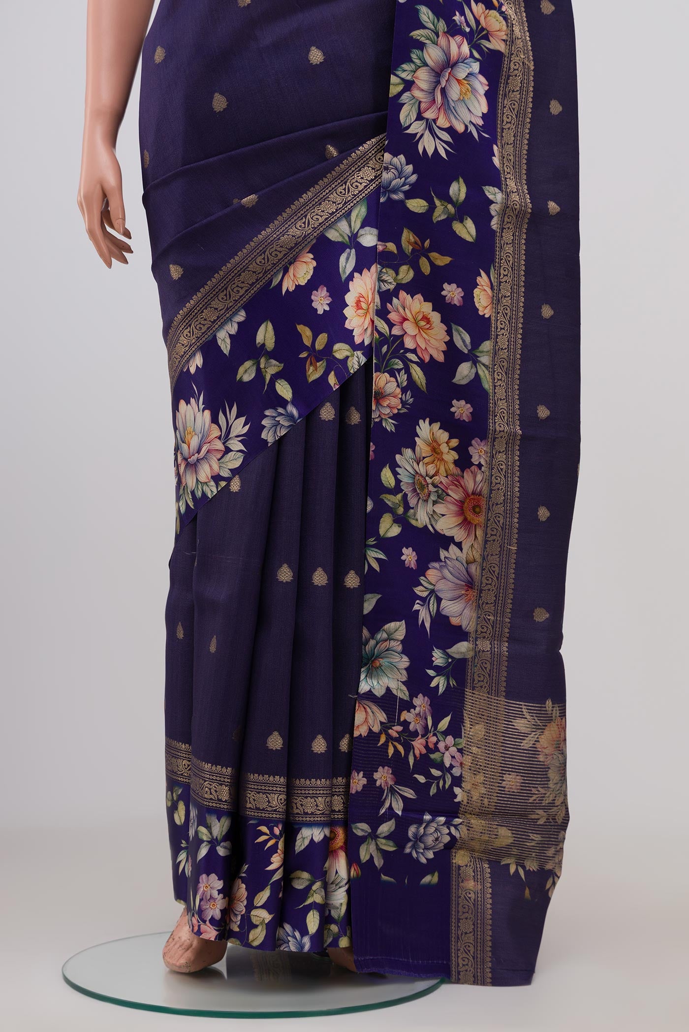 Pleats and pallu of Blue Tussar Silk Saree with Zari Butta on the body and Fancy Border. 