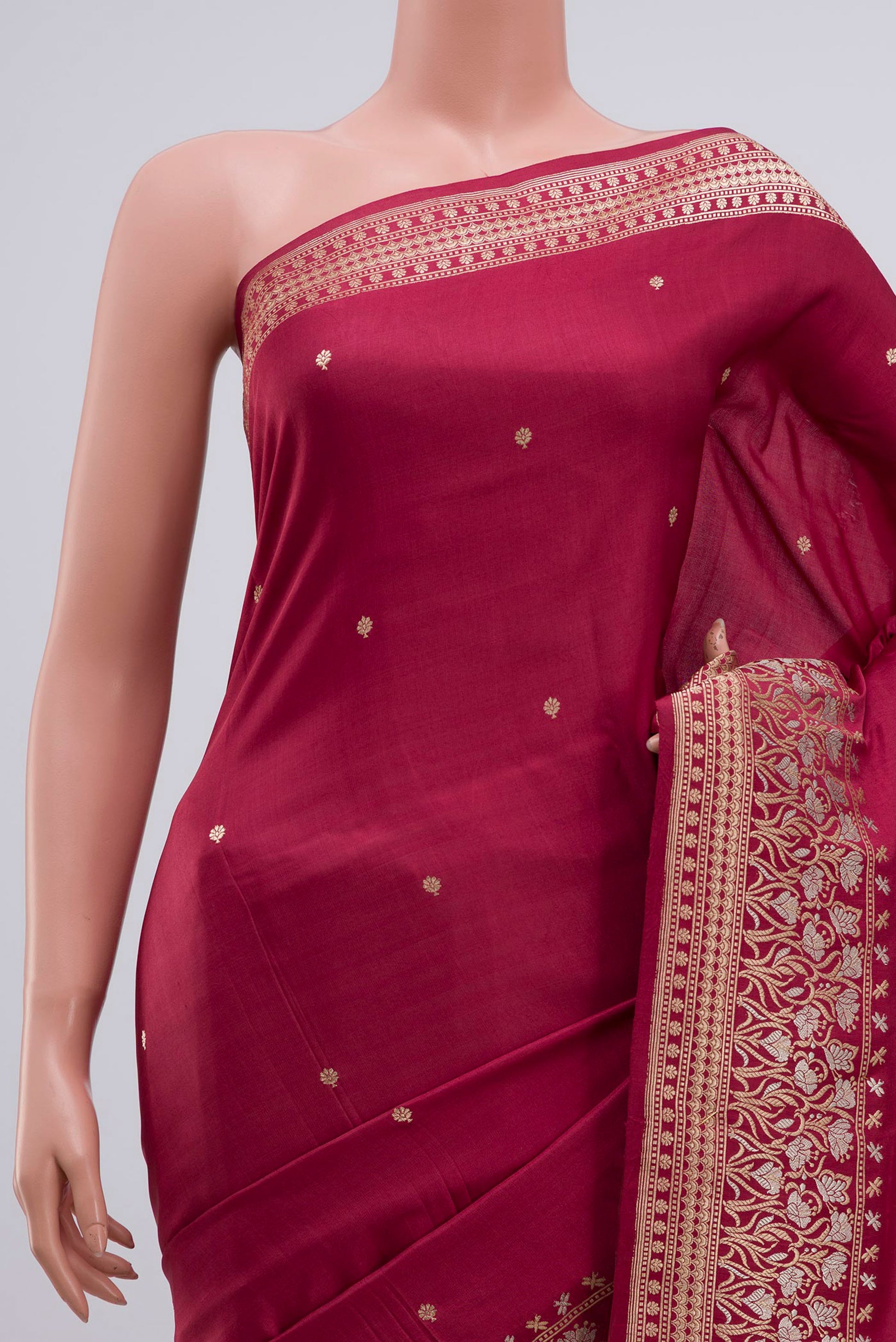 Border image of Maroon Banarasi Silk Saree with Zari Butta on the body and Zari Border. 