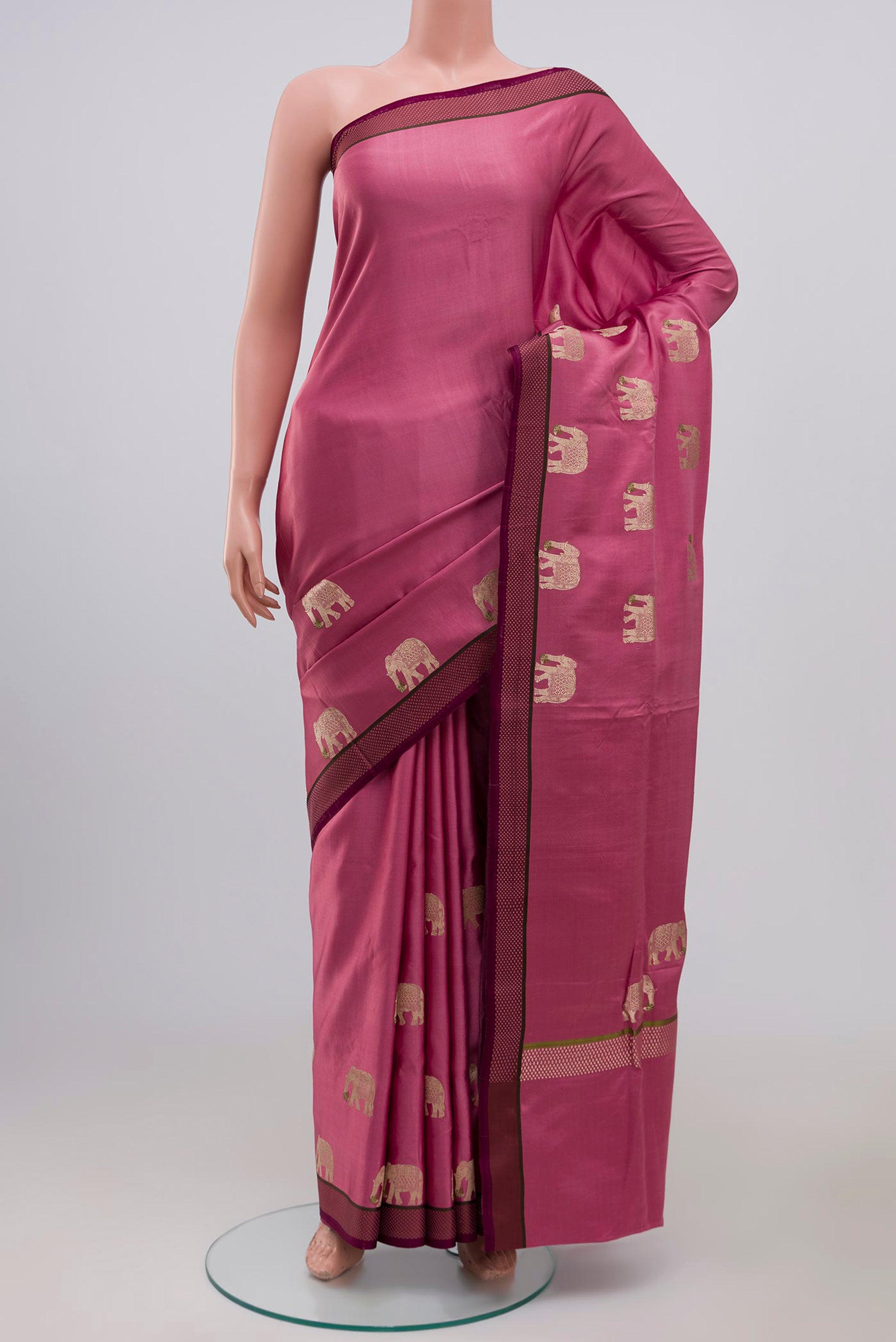 Pink Banarasi Silk Saree with Zari Butta on the body and Thread Border.  displayed on a mannequin
