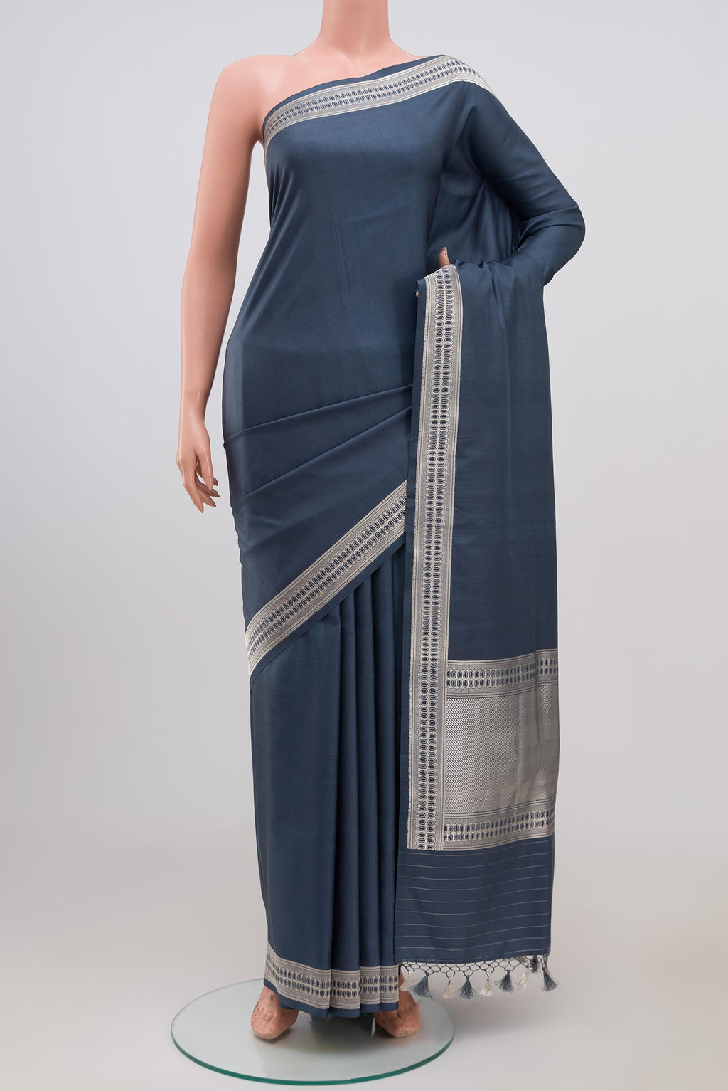 Grey Banarasi Silk Saree with Plain Body and Zari Border.  displayed on a mannequin