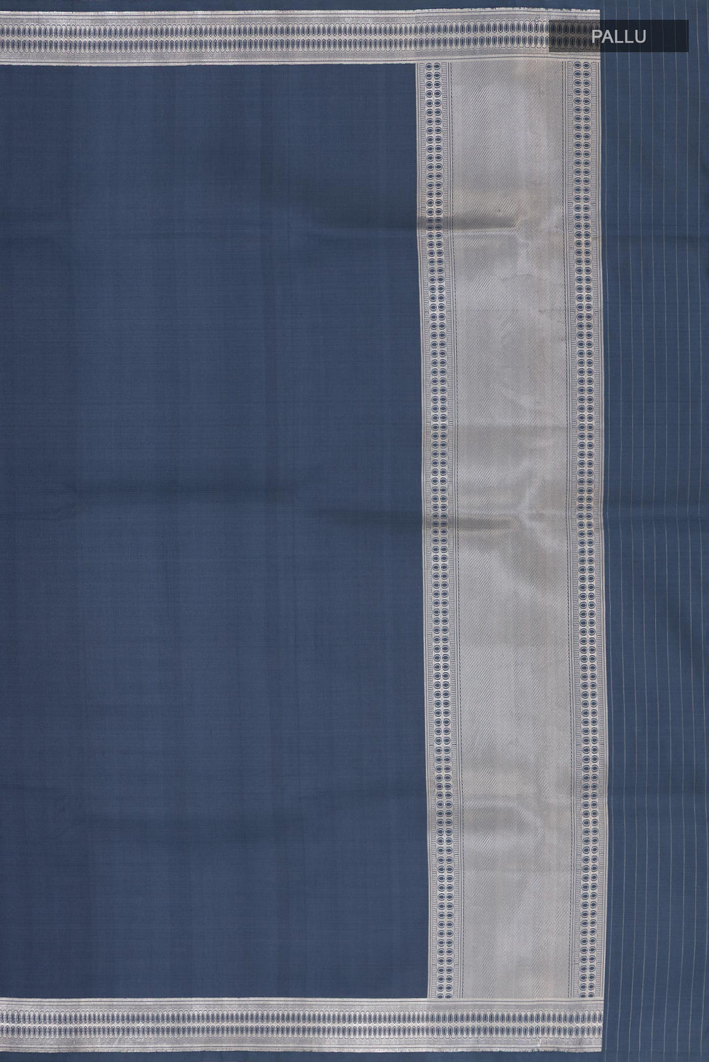 Close up image of the pallu of Grey Banarasi Silk Saree with Plain Body and Zari Border. 