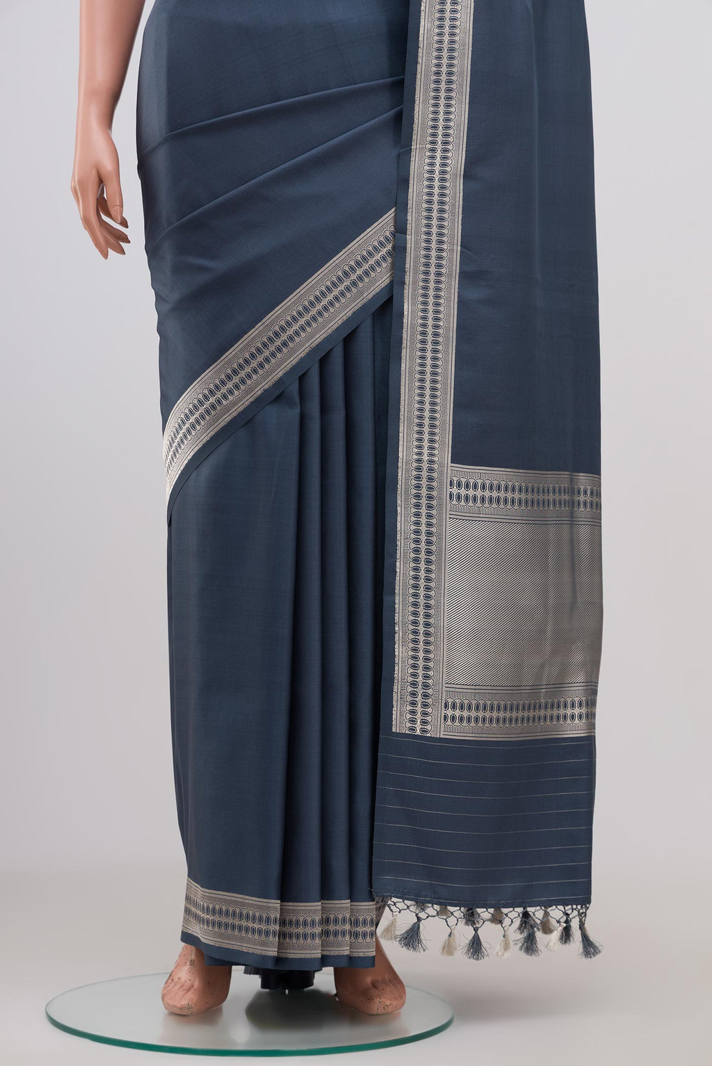 Pleats and pallu of Grey Banarasi Silk Saree with Plain Body and Zari Border. 