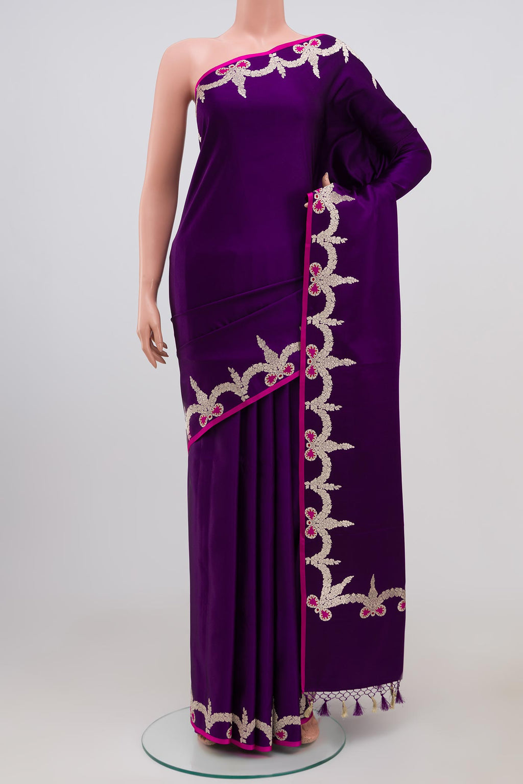 Purple Banarasi Silk Saree with Plain Body and Fancy Border.  displayed on a mannequin