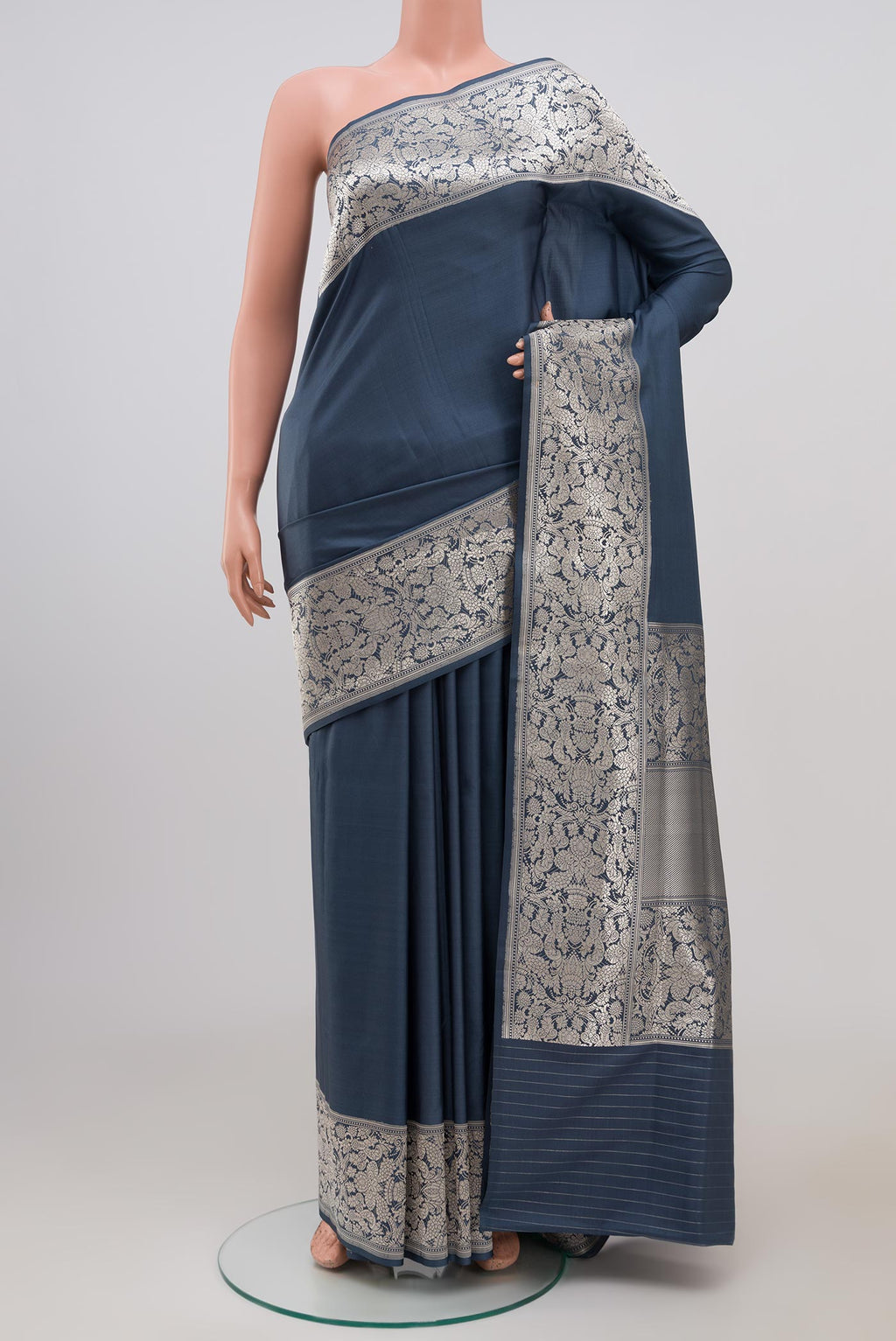 Grey Banarasi Silk Saree with Plain Body and Fancy Border.  displayed on a mannequin