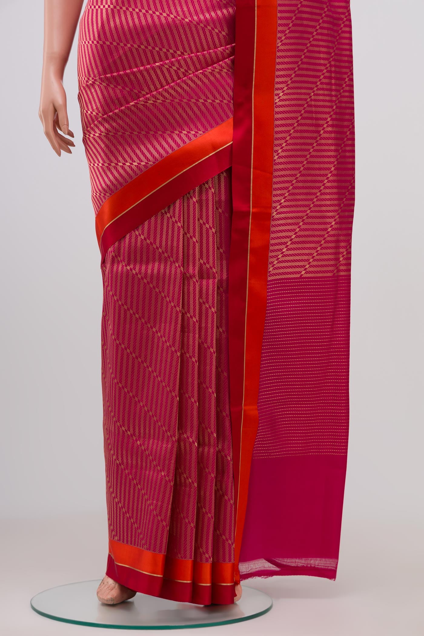 Pleats and pallu of Pink Banarasi Silk Saree with Zari Brocade on the body and Thin Zari Line. 