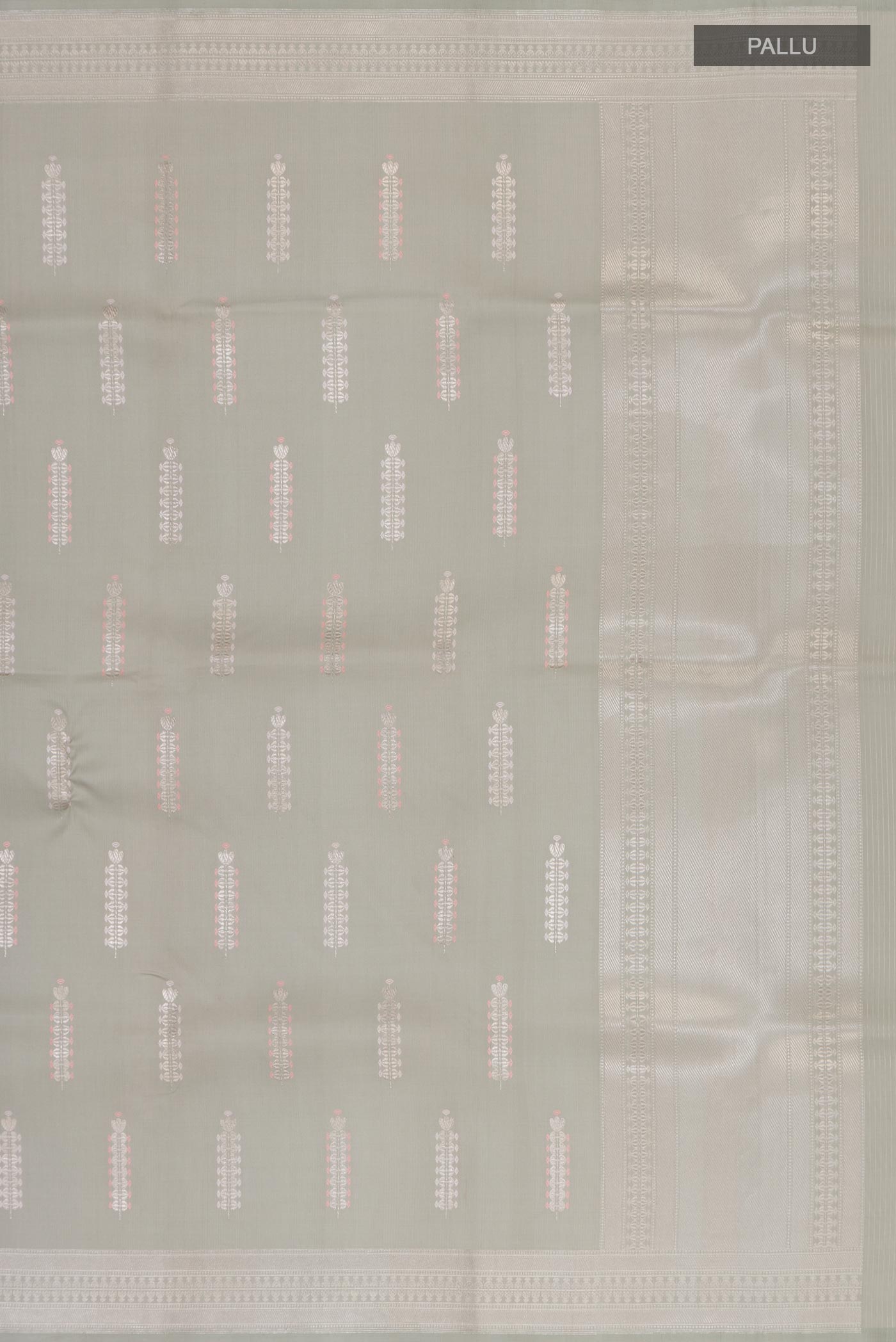 Close up image of the pallu of Grey Banarasi Silk Saree with Zari Butta on the body and Zari Border. 