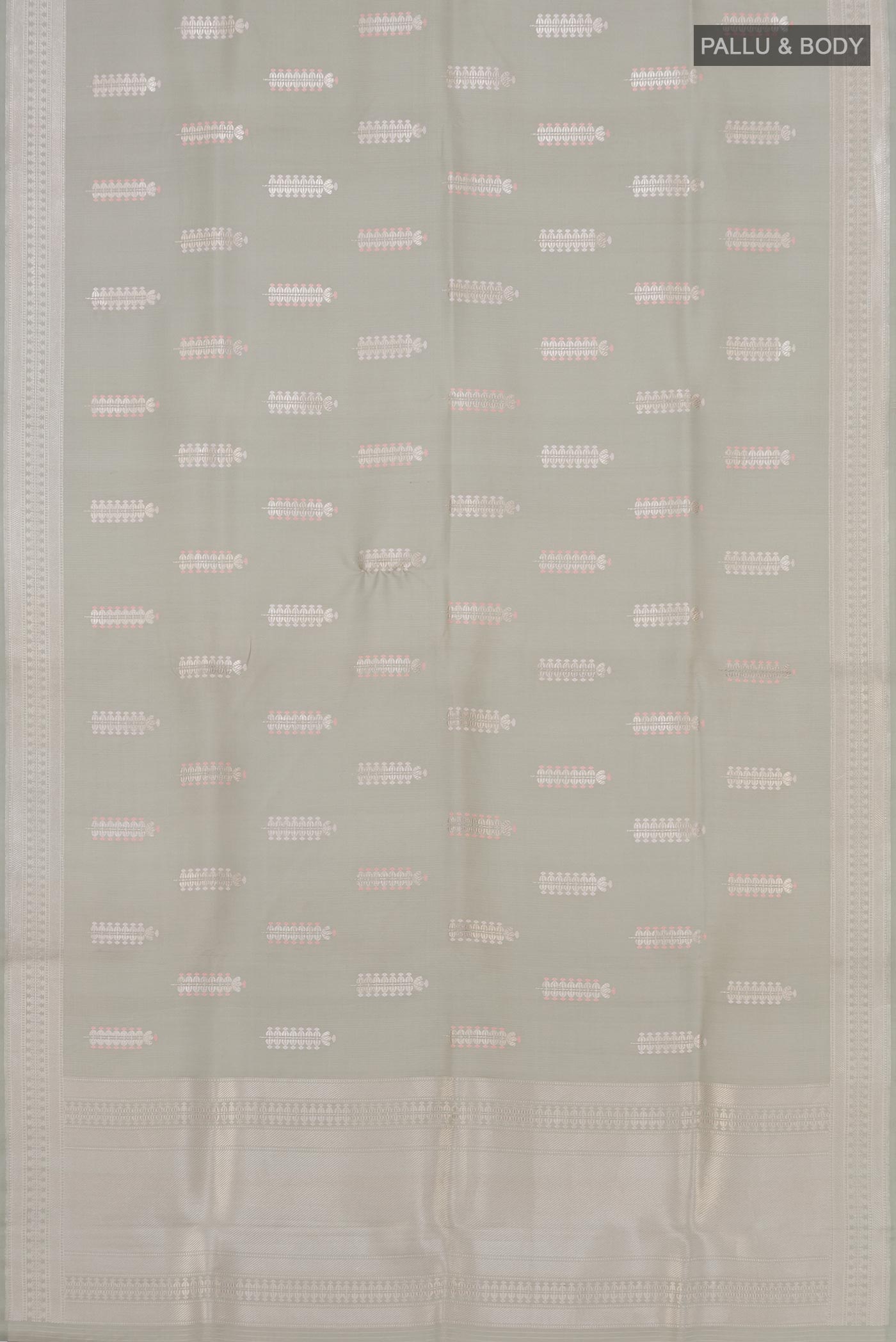 Flat view of Grey Banarasi Silk Saree with Zari Butta on the body and Zari Border. 