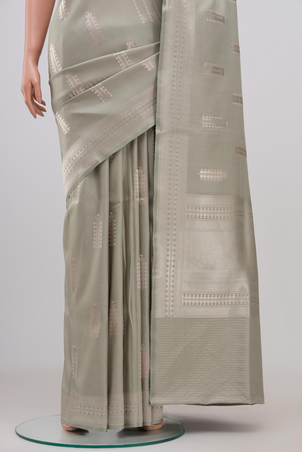Pleats and pallu of Grey Banarasi Silk Saree with Zari Butta on the body and Zari Border. 