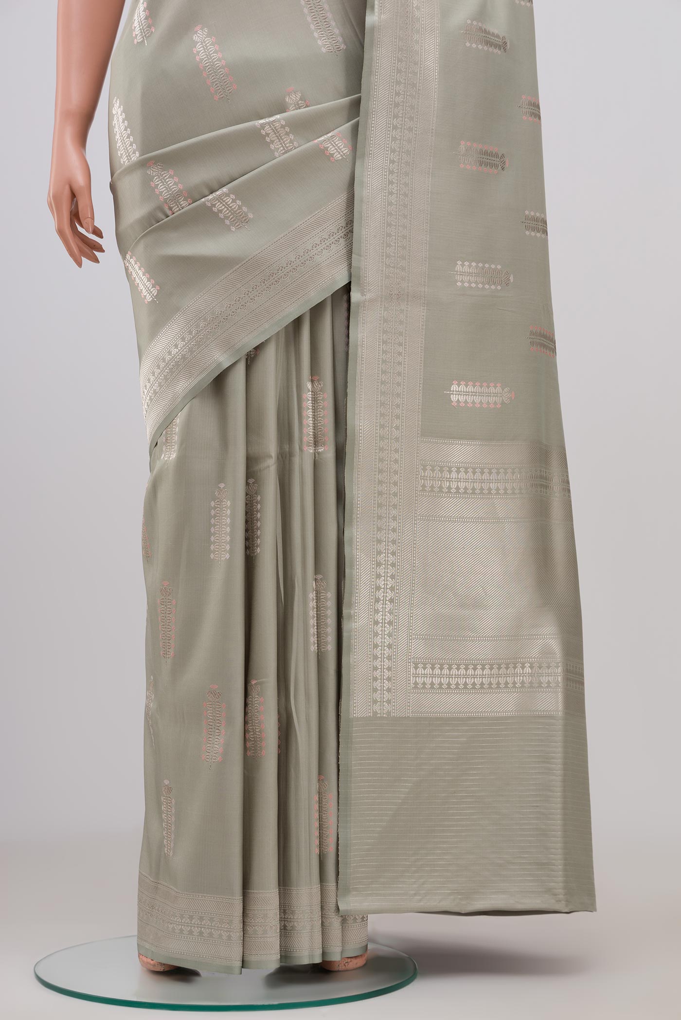 Pleats and pallu of Grey Banarasi Silk Saree with Zari Butta on the body and Zari Border. 