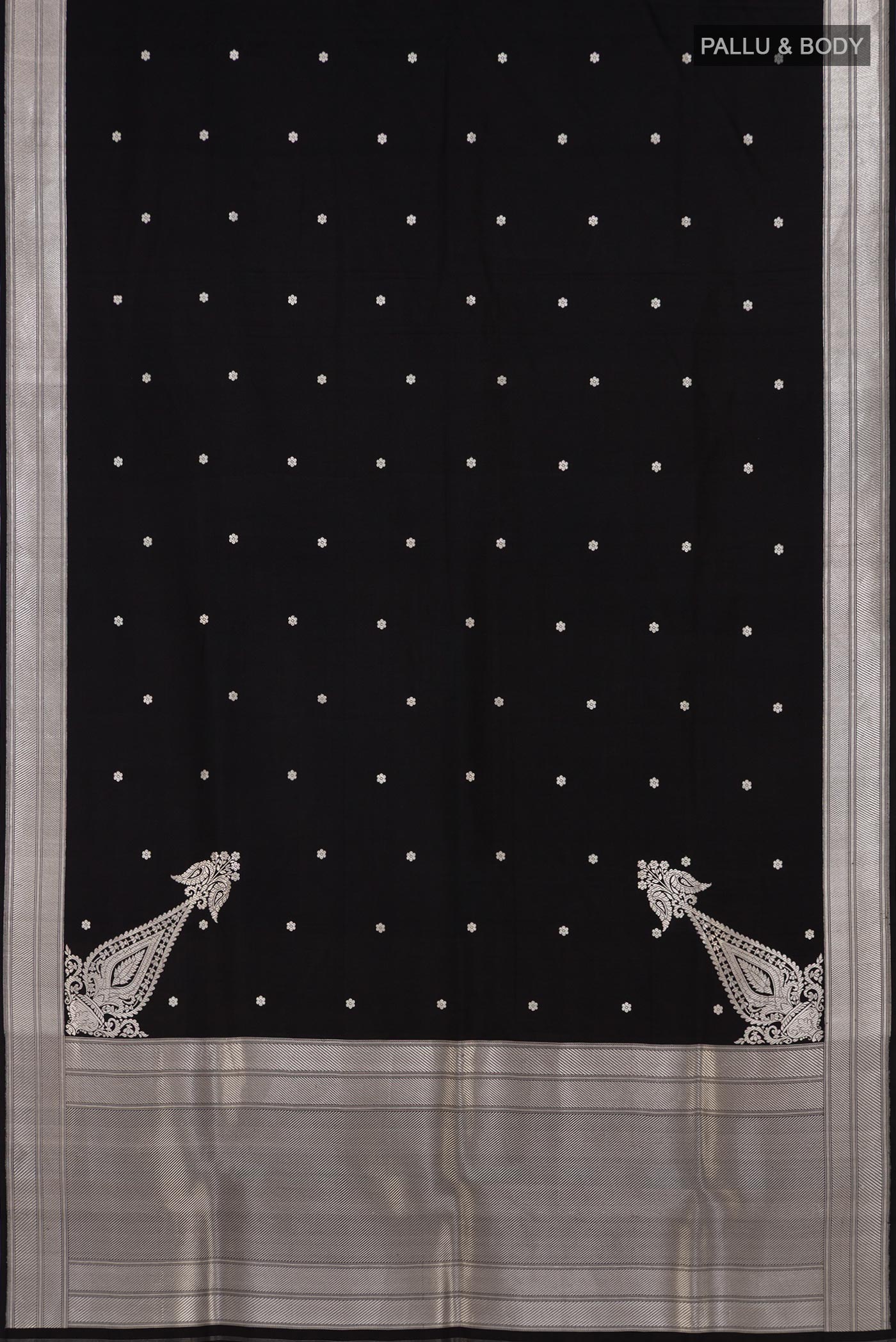 Flat view of Black Banarasi Silk Saree with Zari Butta on the body and Zari Border. 