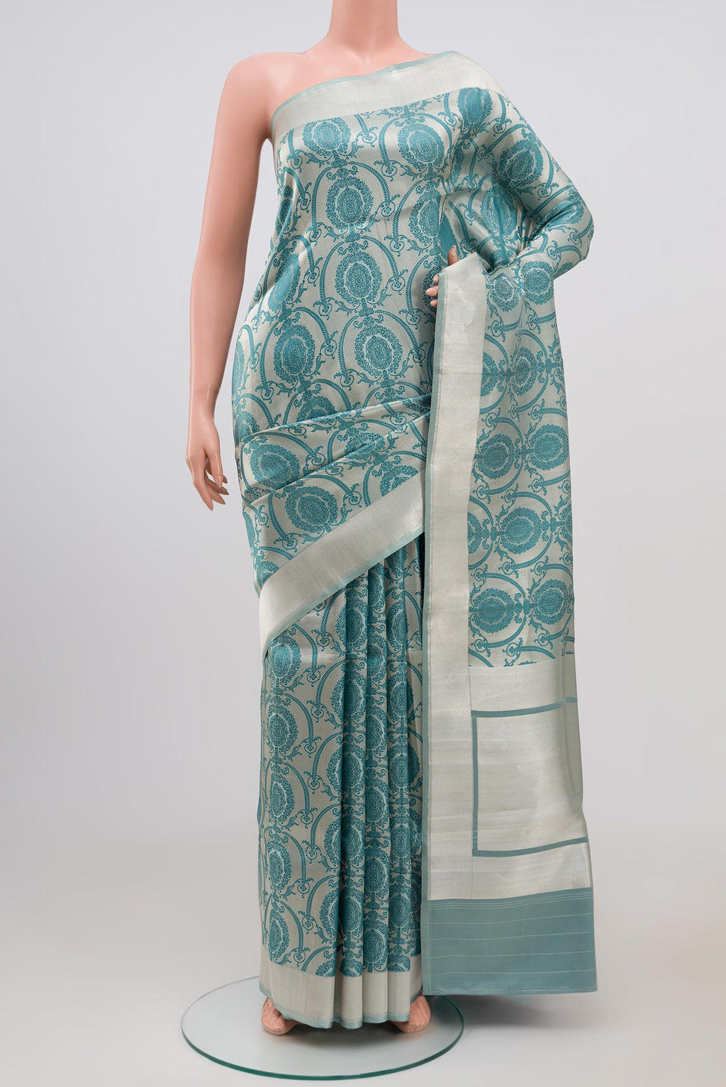 Grey Banarasi Silk Saree with Zari Brocade on the body and Zari Border.  displayed on a mannequin