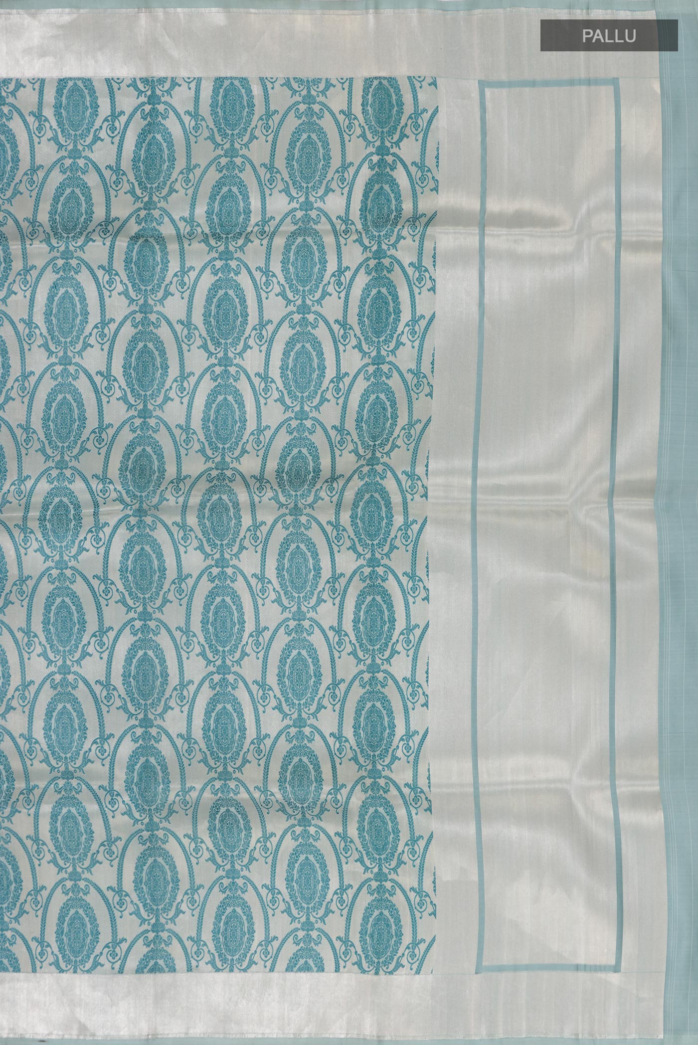 Close up image of the pallu of Grey Banarasi Silk Saree with Zari Brocade on the body and Zari Border. 