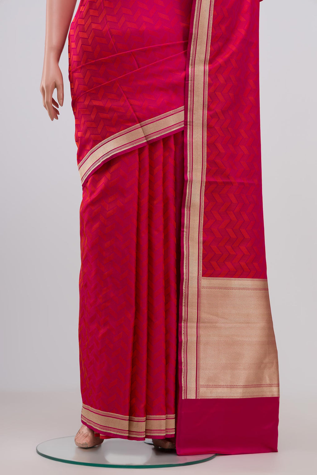 Pleats and pallu of Pink Banarasi Silk Saree with Jacquard design on the body and Zari Border. 