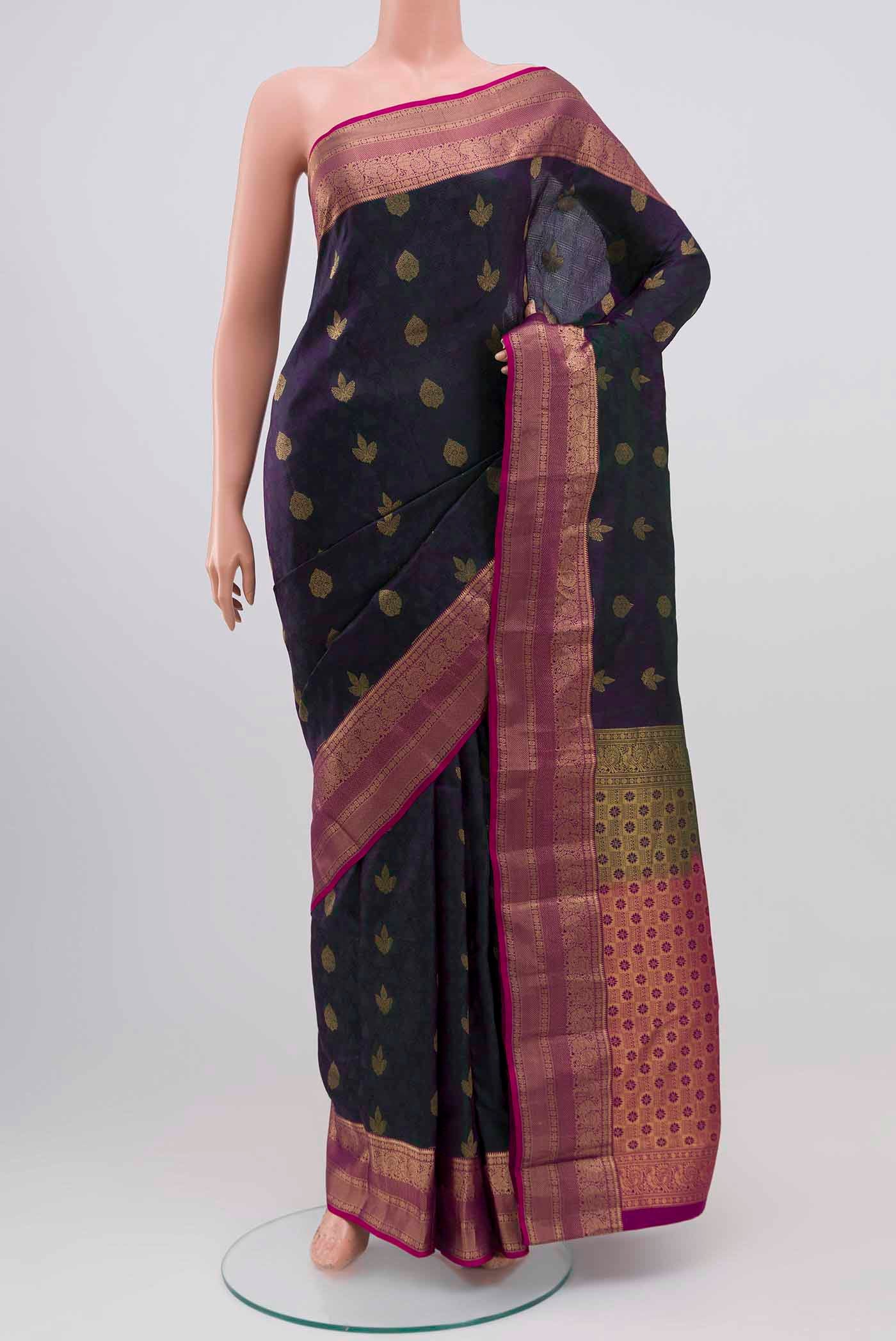 Green With Purple Color Kanchipuram Silk Saree with Jacquard With Zari Butta on the body and Zari Border displayed on a mannequin