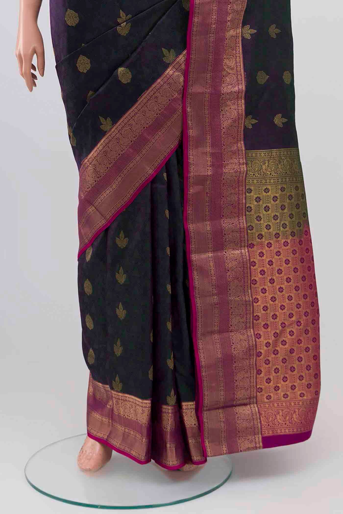 Pleats and pallu of Green With Purple Color Kanchipuram Silk Saree with Jacquard With Zari Butta on the body and Zari Border