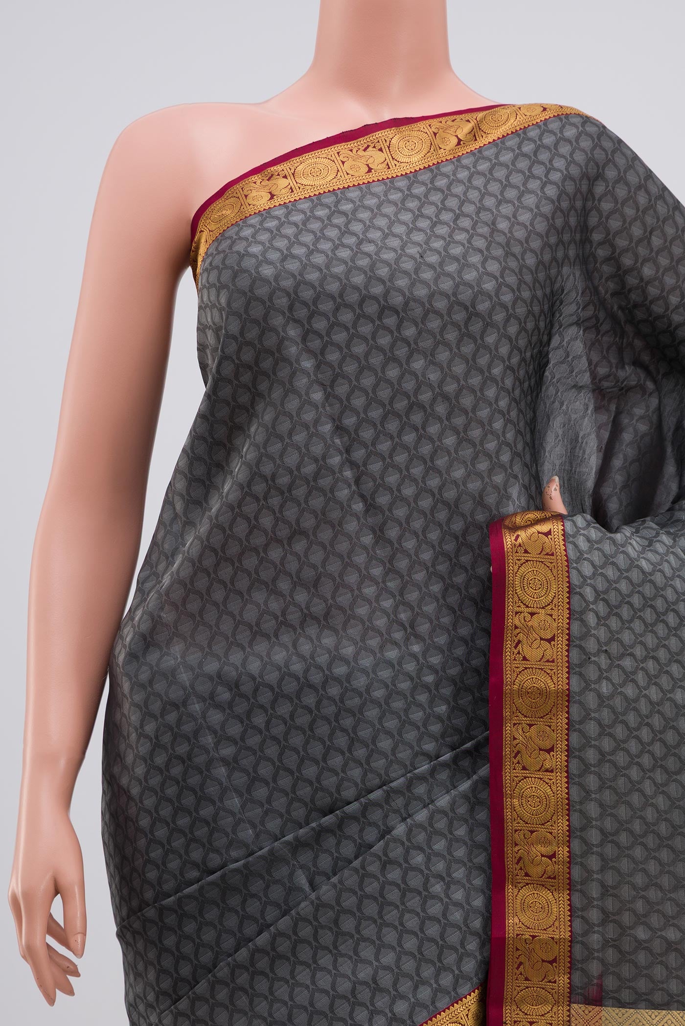 Border image of Grey Kanjivaram Saree with Jacquard design on the body and Zari Border. 