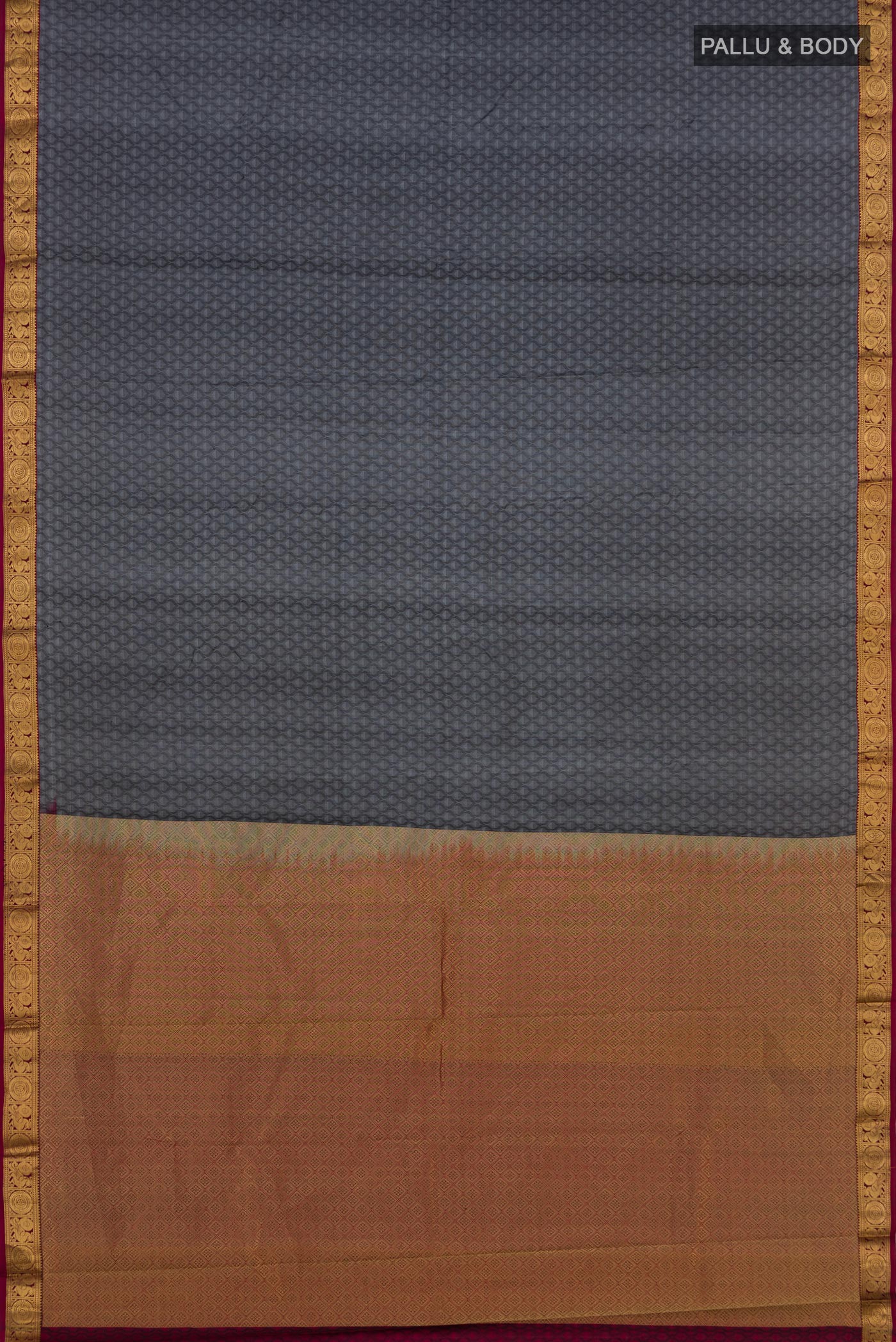 Flat view of Grey Kanjivaram Saree with Jacquard design on the body and Zari Border. 