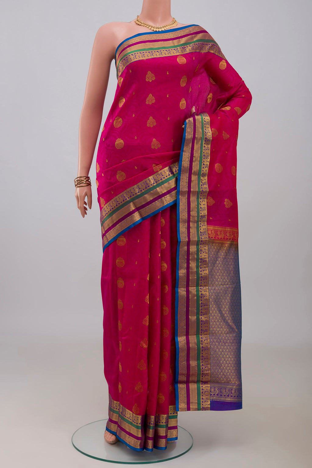 Pink Kanchipuram Silk Saree with Jacquard With Zari Butta on the body and Zari Border.  displayed on a mannequin