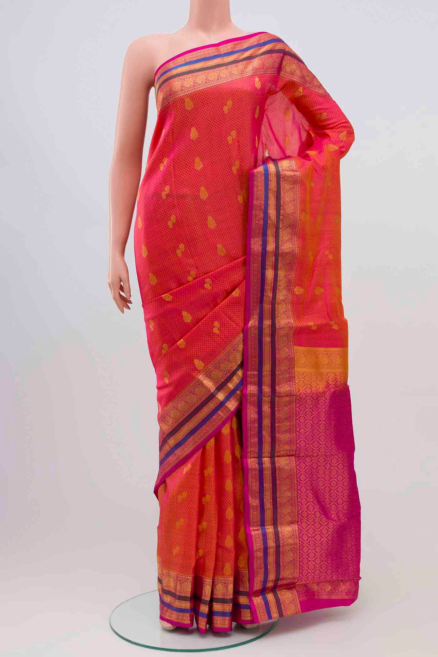 Pink with Yellow Color Kanchipuram Silk Saree with Jacquard With Zari Butta on the body and Zari Border displayed on a mannequin